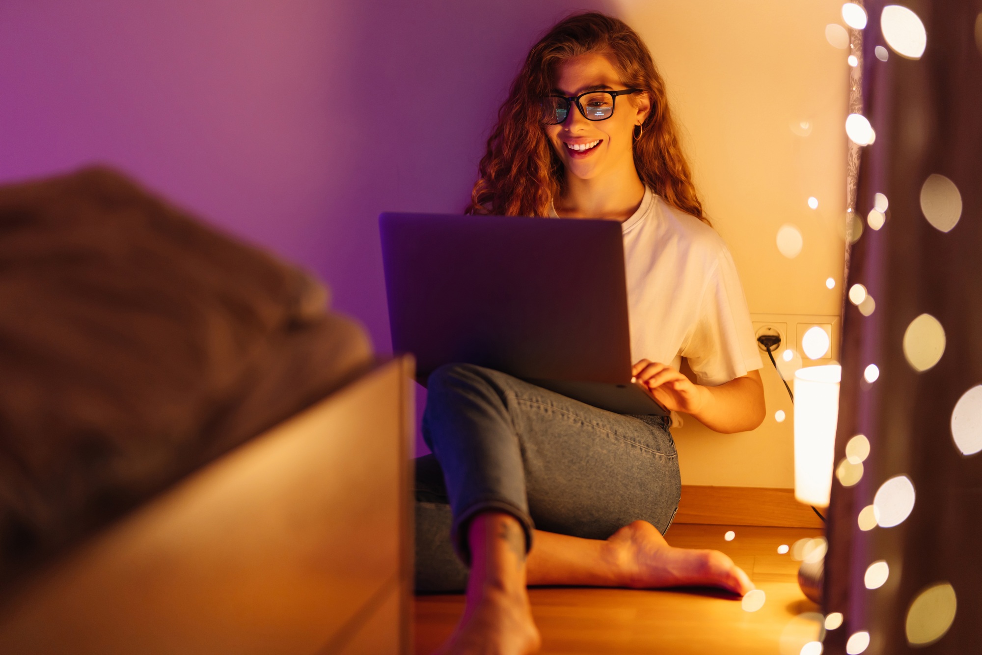 Woman working online on laptop computer at home. Business, blogging, freelance, education concept.