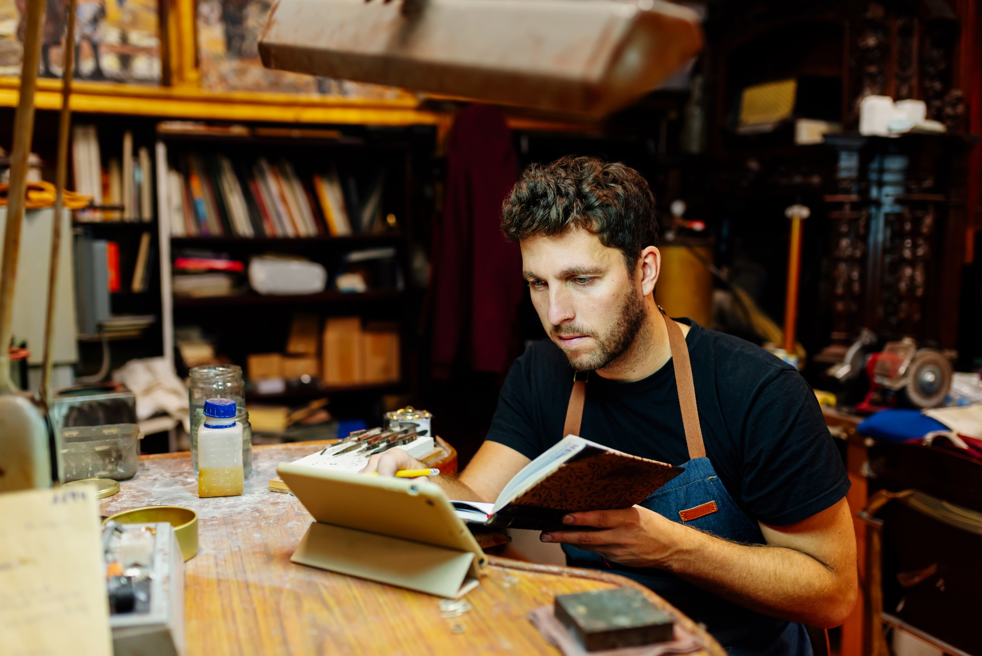 Young man in his craft workshop