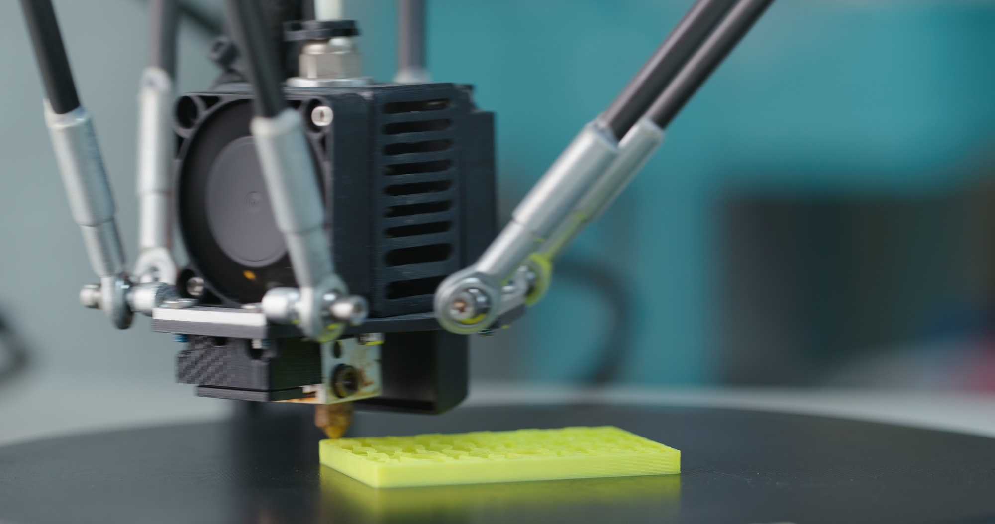 3D Printing Machine printing a piece of plastic