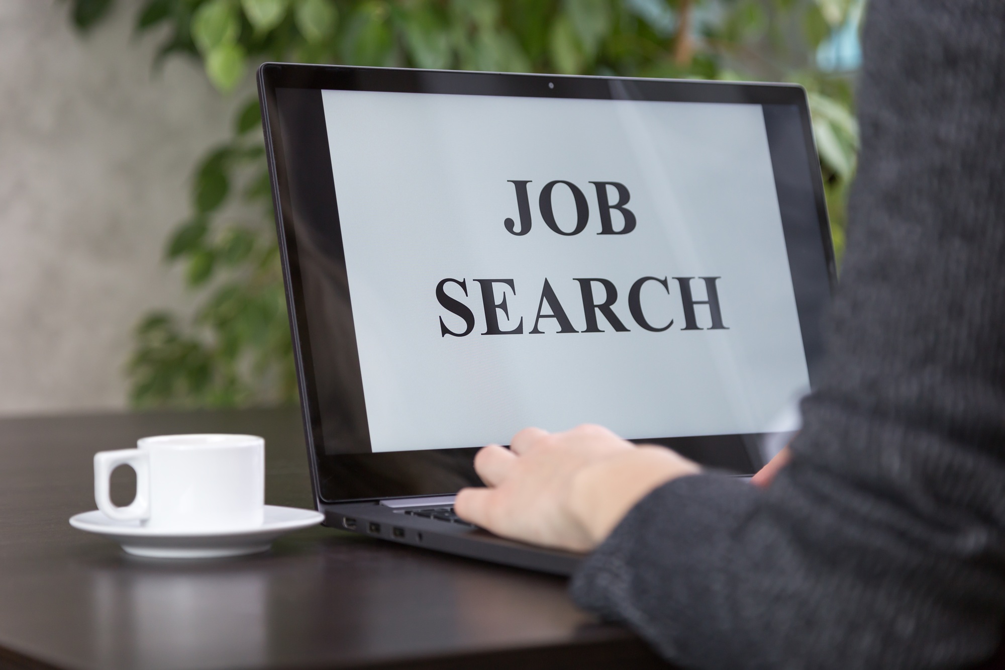 a girl looking for a job on the Internet
