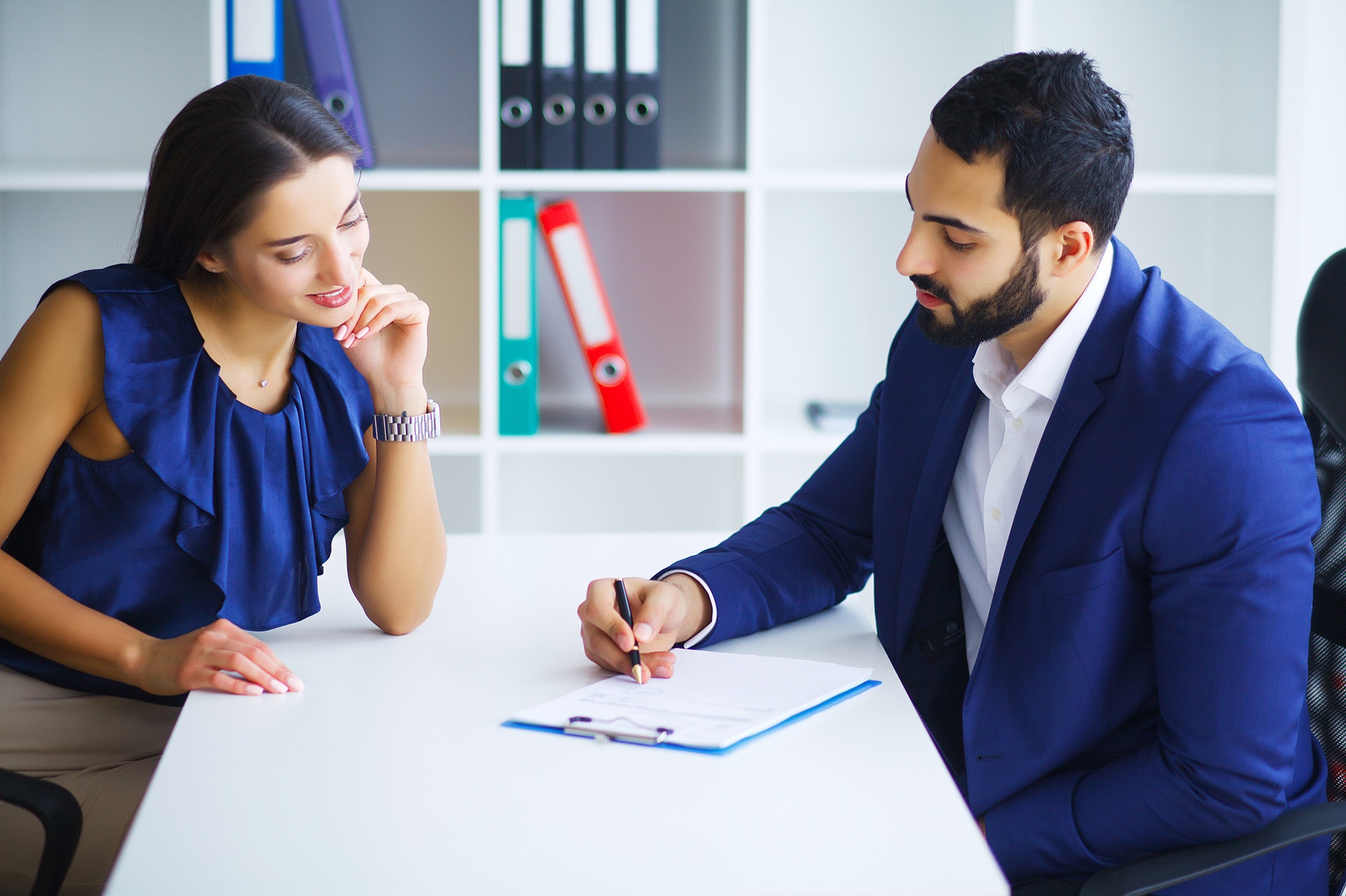 A people in the office signing contract