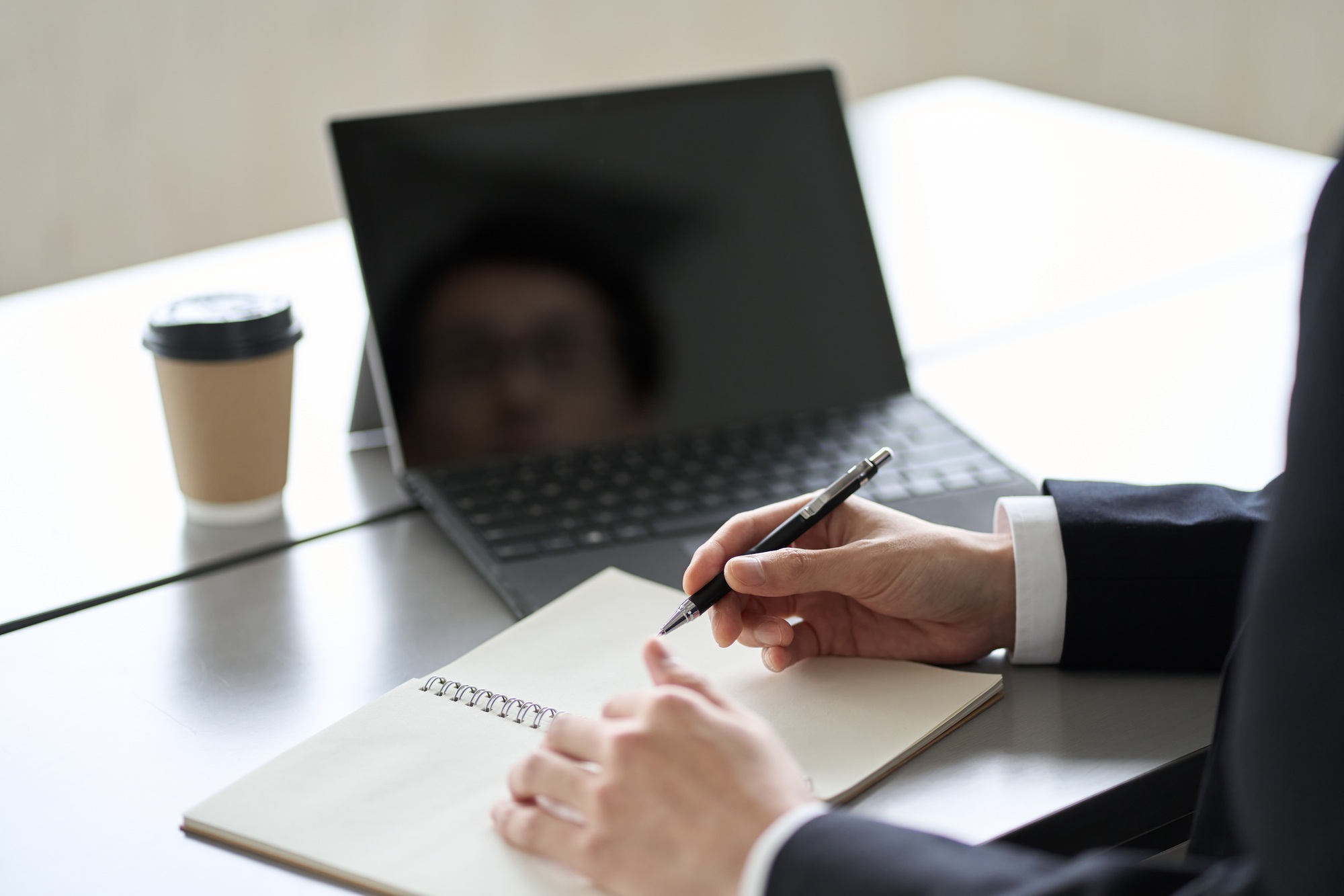 Asian businessman studying online on computer