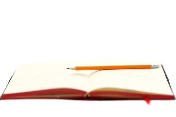 Business concept. Top view collection of notebook, white open flip curl rolled page and pencil