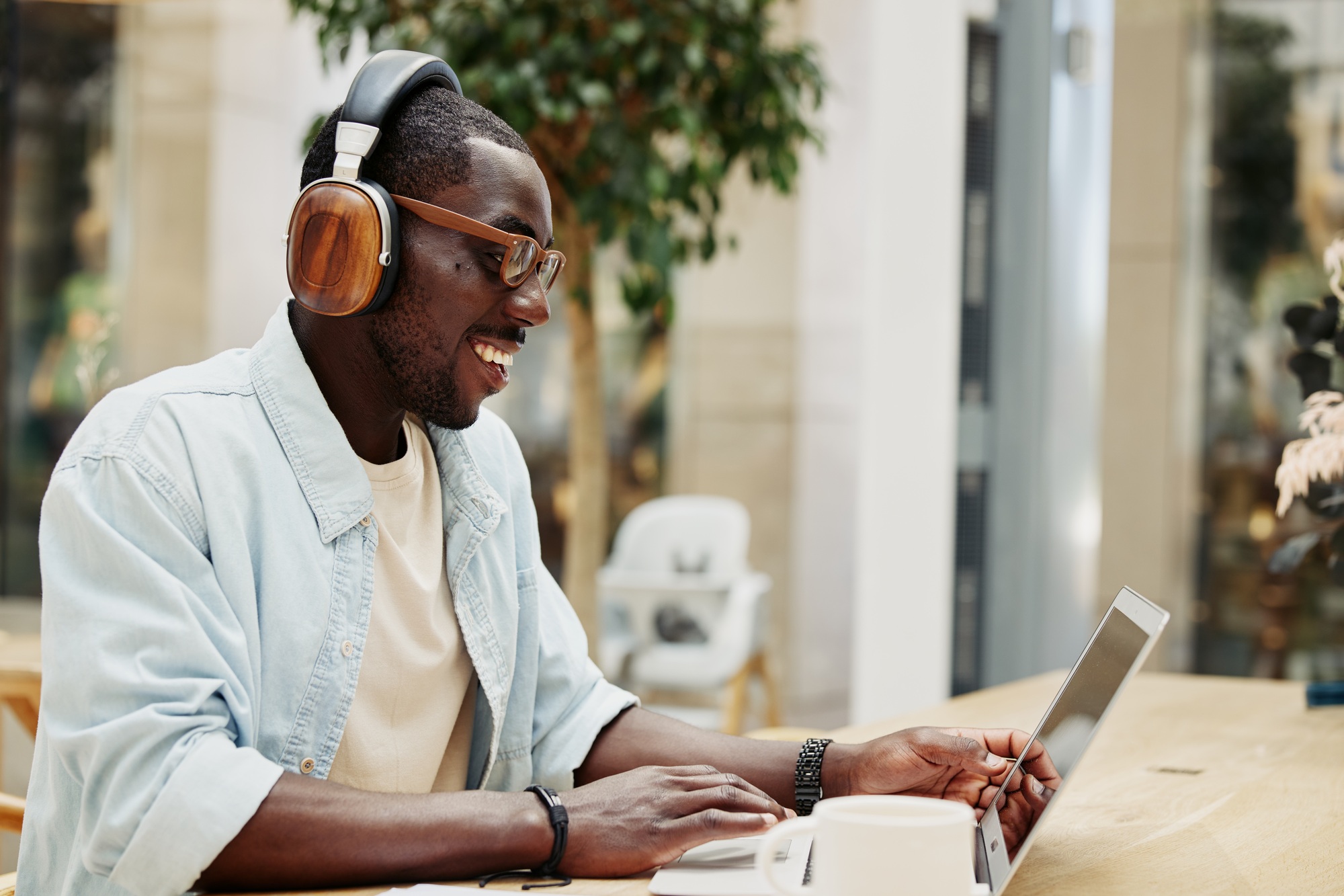 Business man communication businessman music computer lifestyle sitting male laptop adult technology