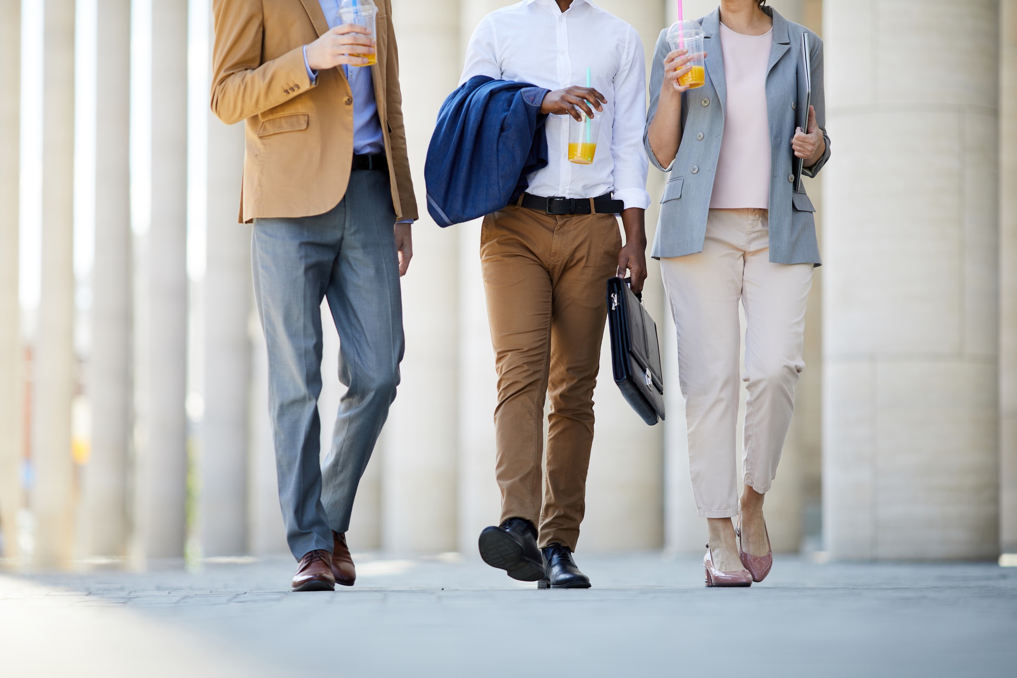 Business people with smoothie mugs
