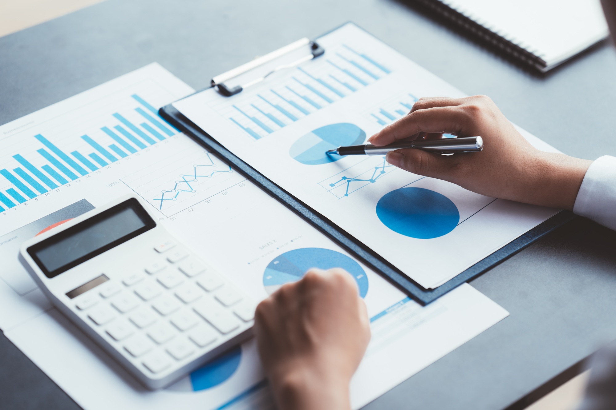 Businessman Accounting Calculating Cost Economic Financial data.