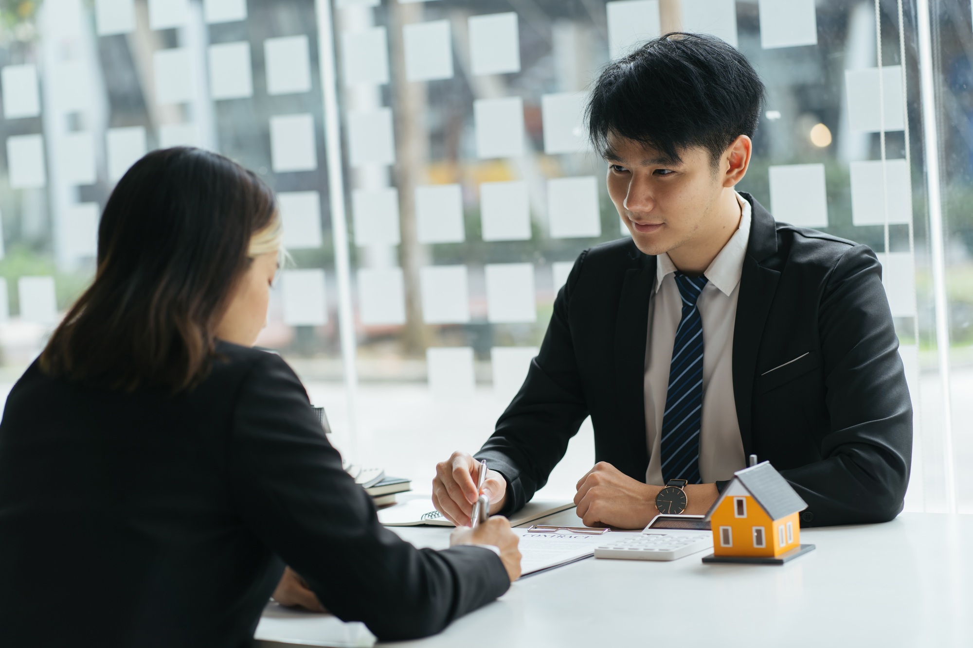 Businessman planing investment property estate next year 2022. analysis marketing strategy for the b