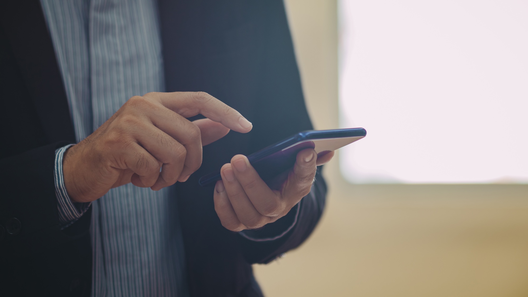 businessman using smart phone for checking email