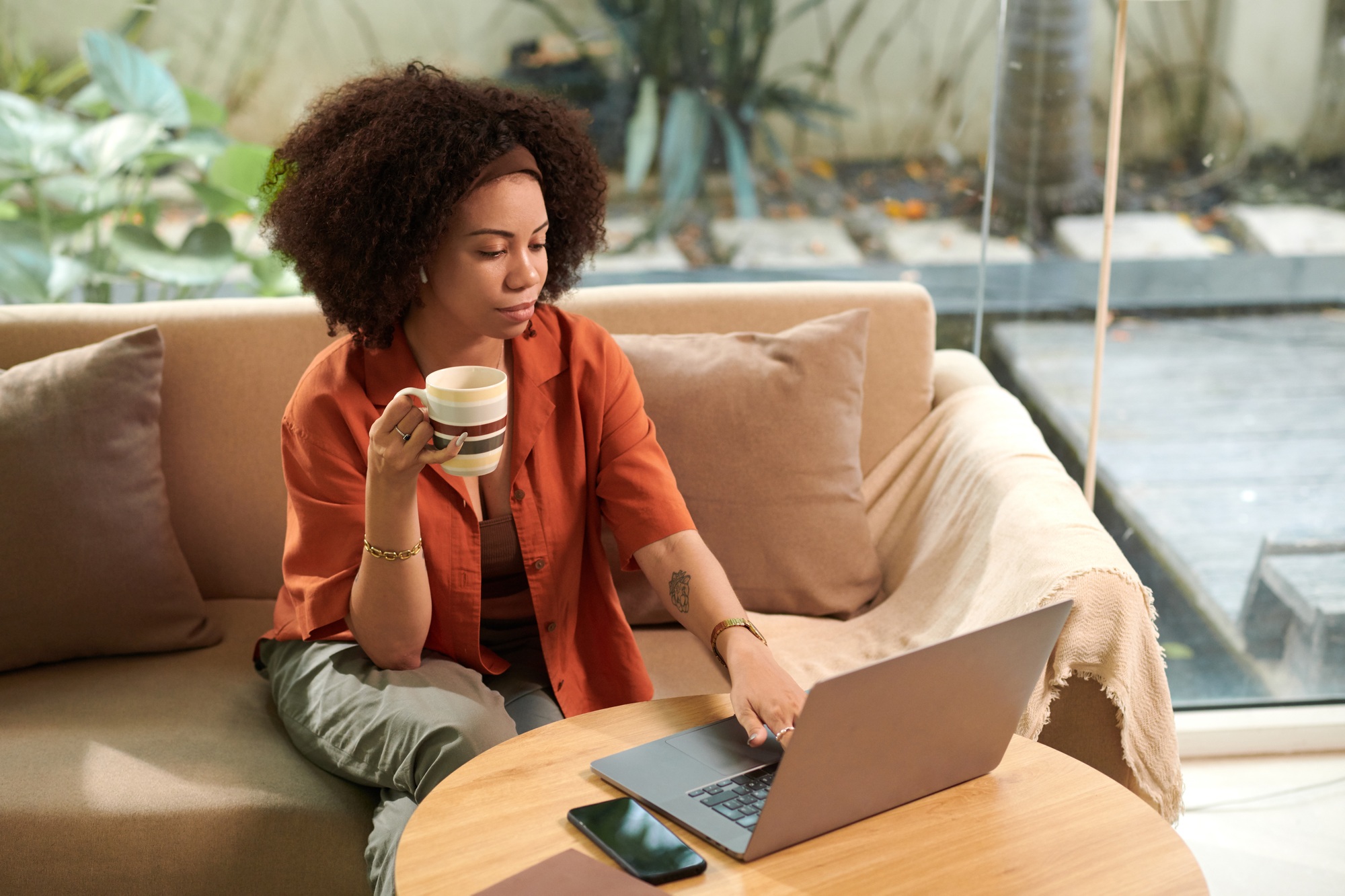 Businesswoman Answering Emails from Colleagues