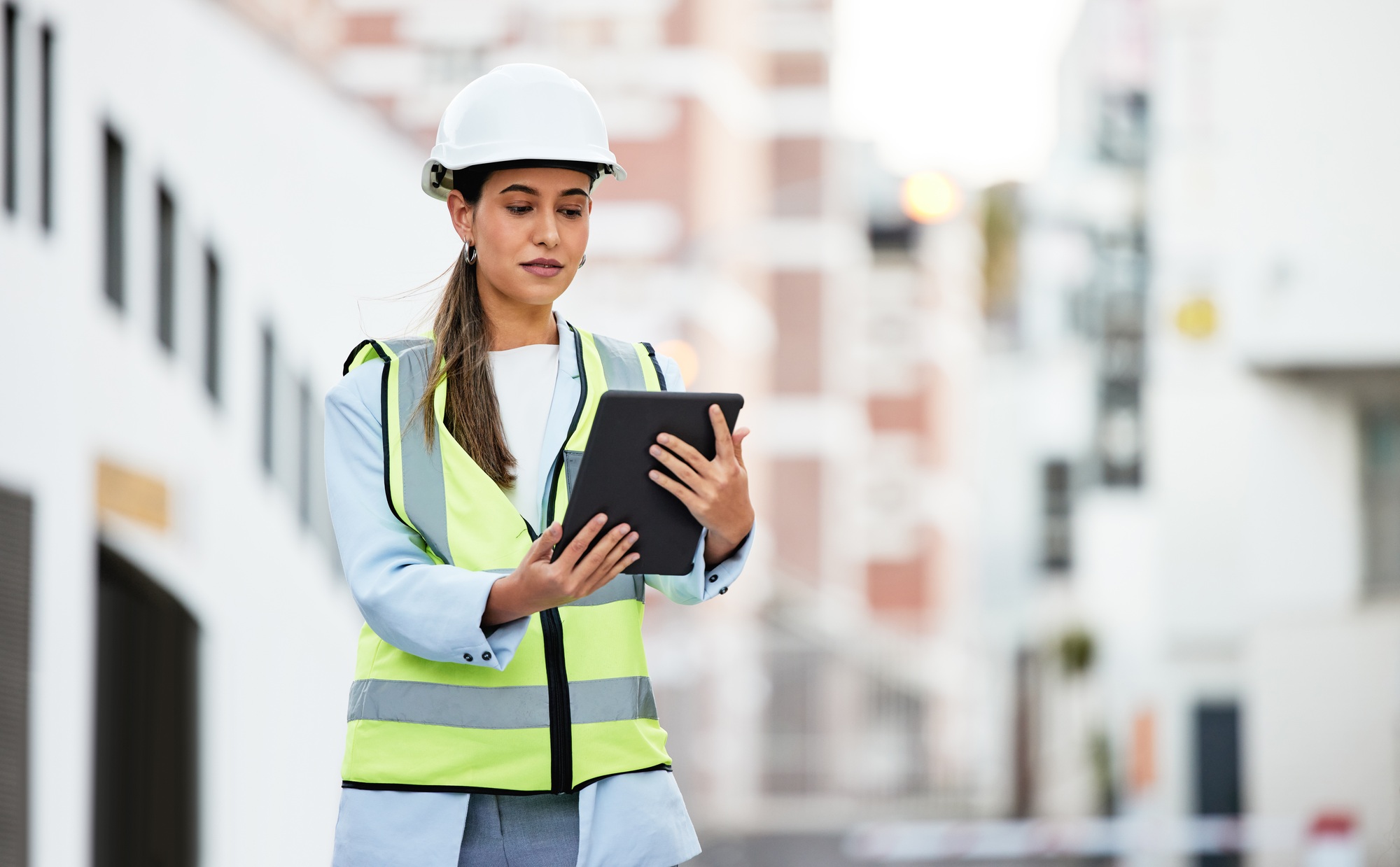 City, digital tablet and woman construction worker with software app for management, site planning
