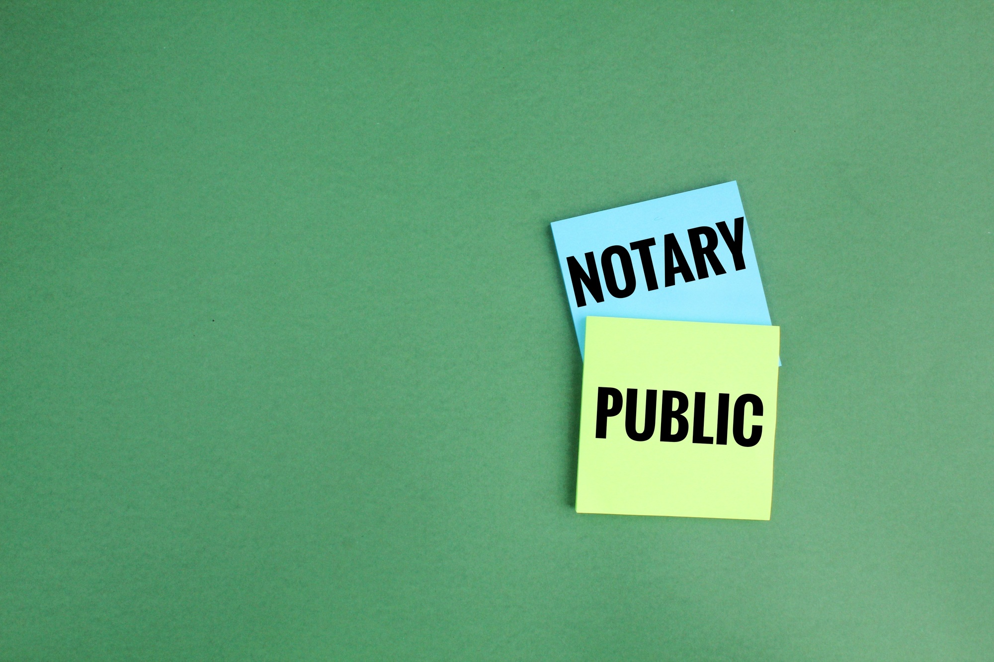 colored paper with the words Notary Public.