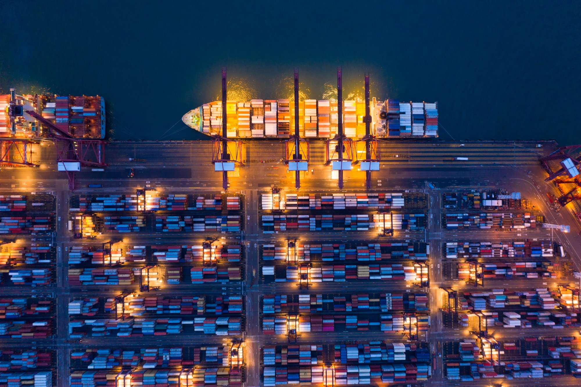 container cargo ship in the export and import business and logistics. Shipping to the harbor