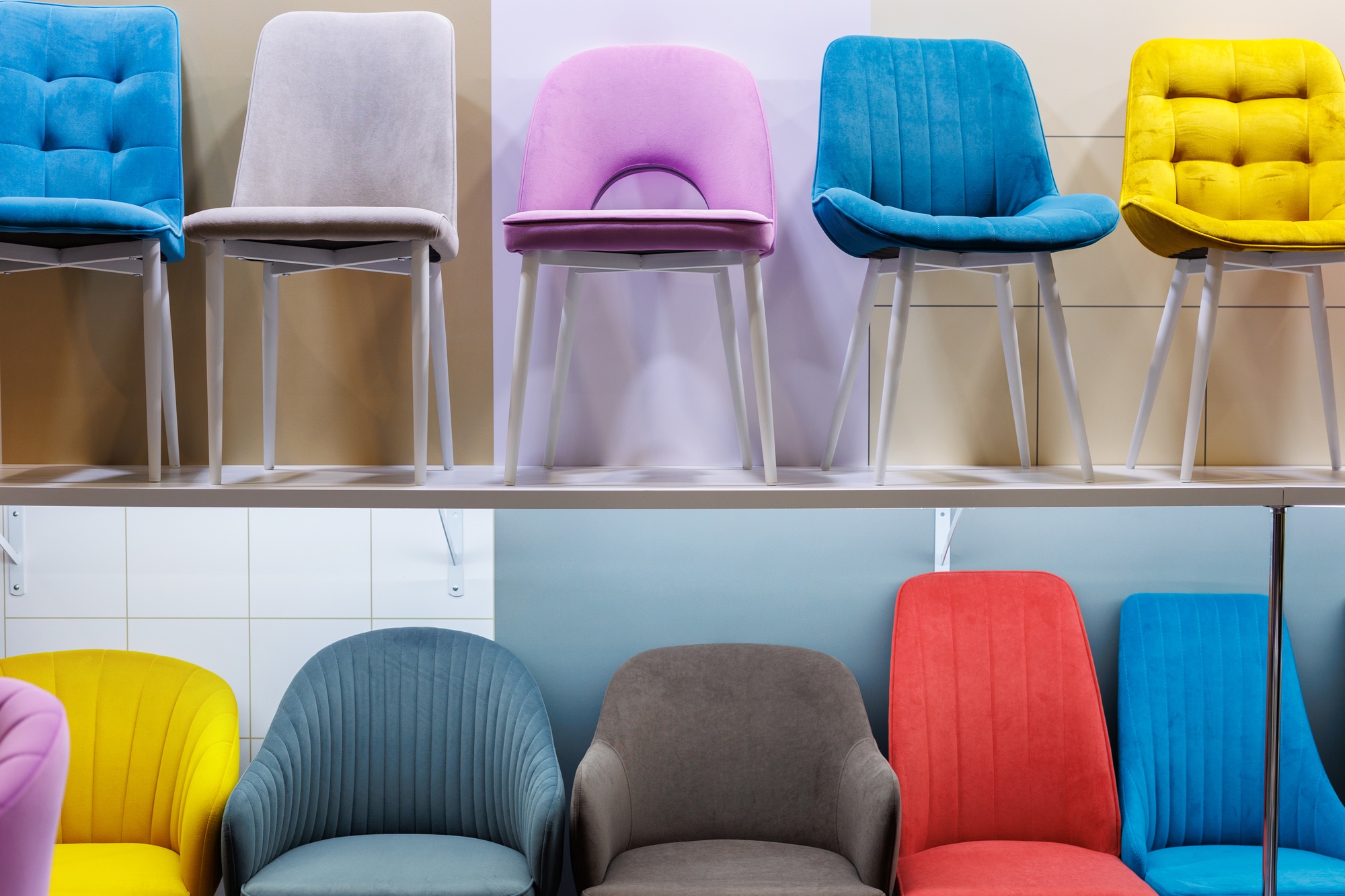 Display of chairs in retail space of furniture store.