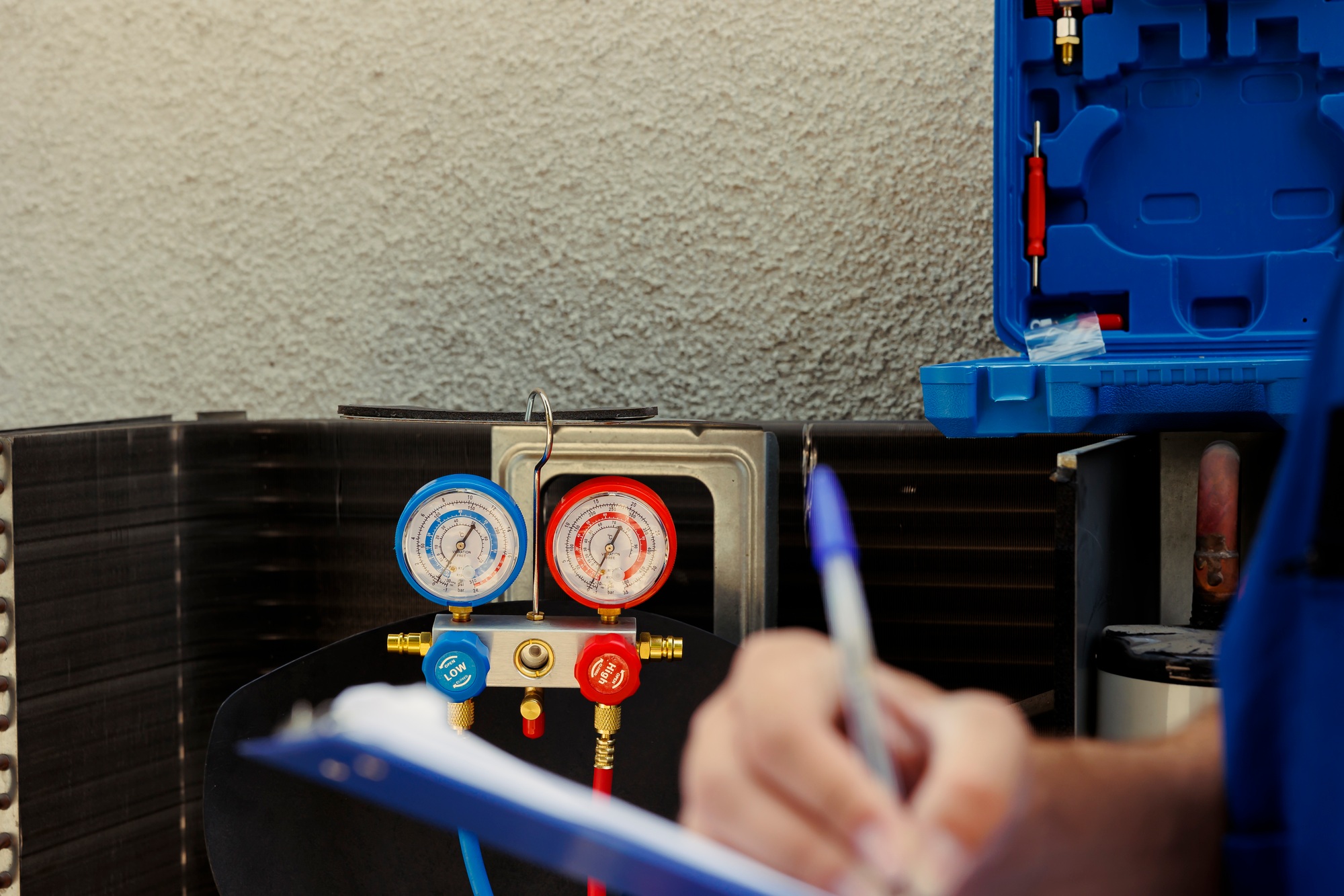 Electrician fills out insurance contract