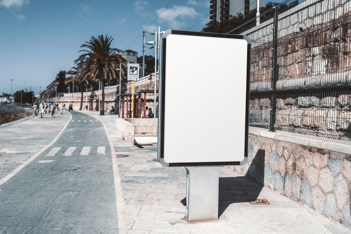 Empty white outdoor billboard