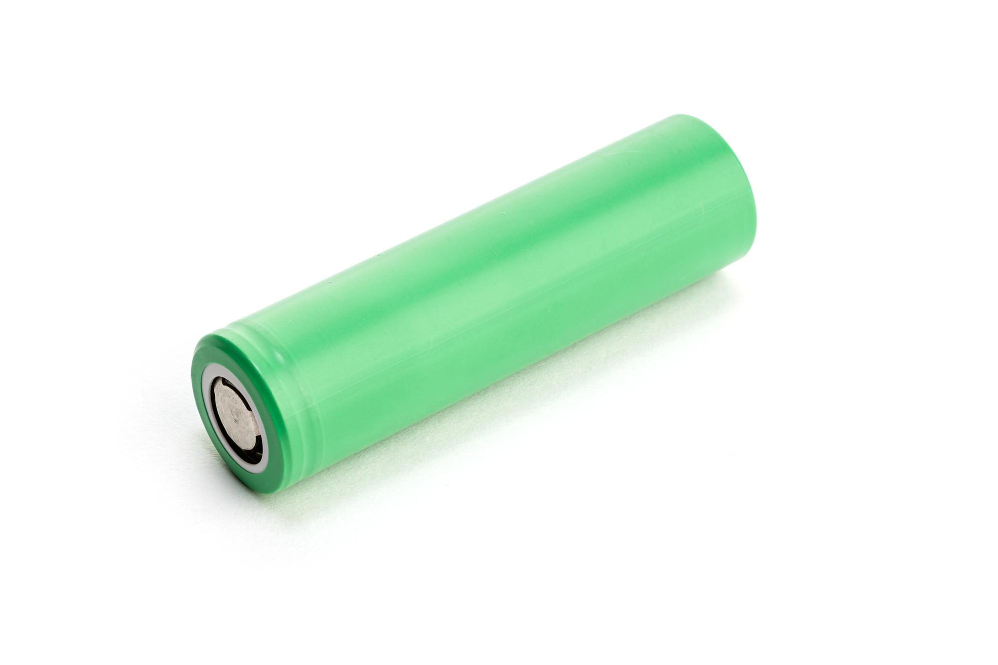 Green battery isolated on white background