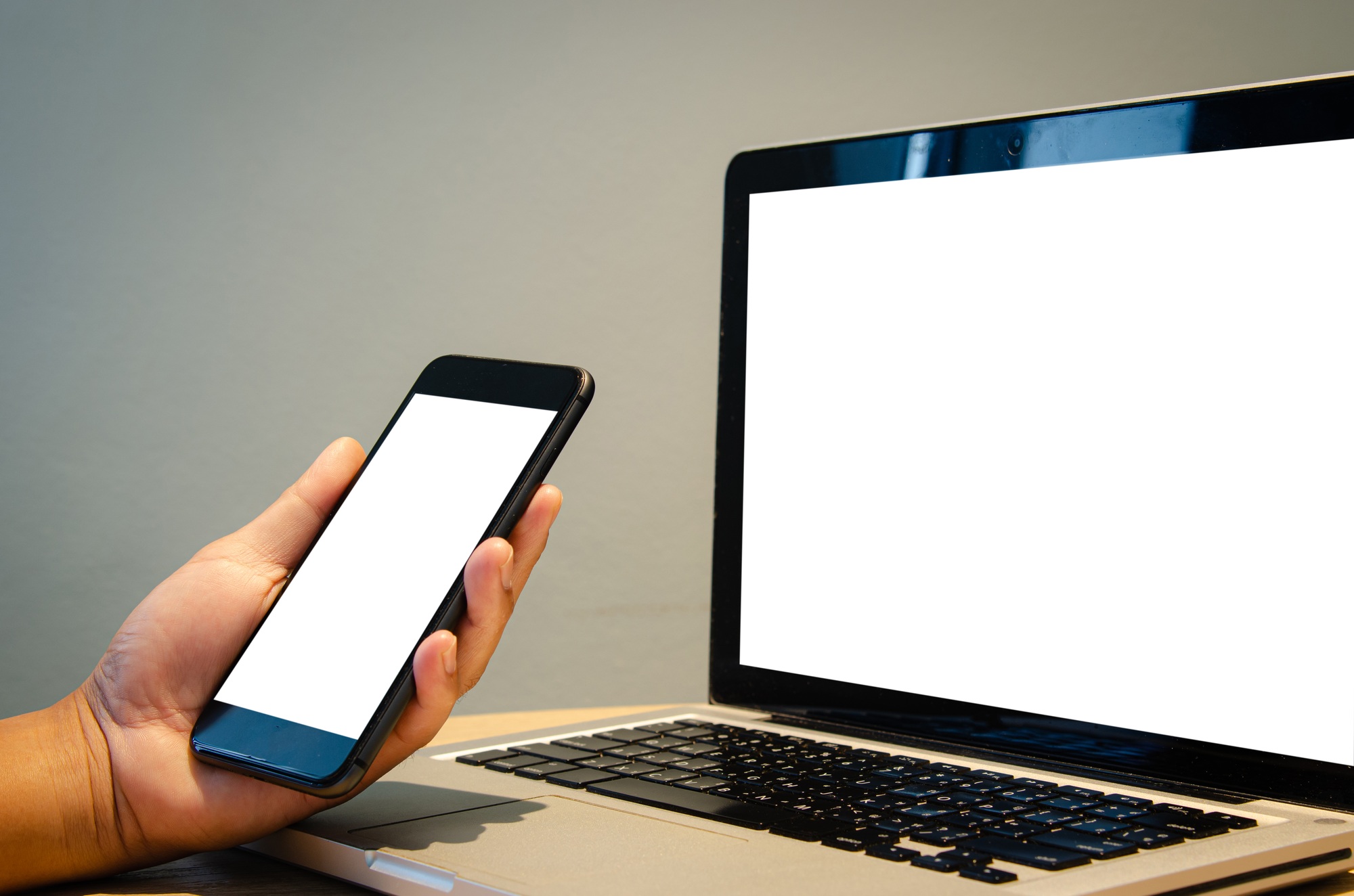 hand holding phone mockup image blank screen