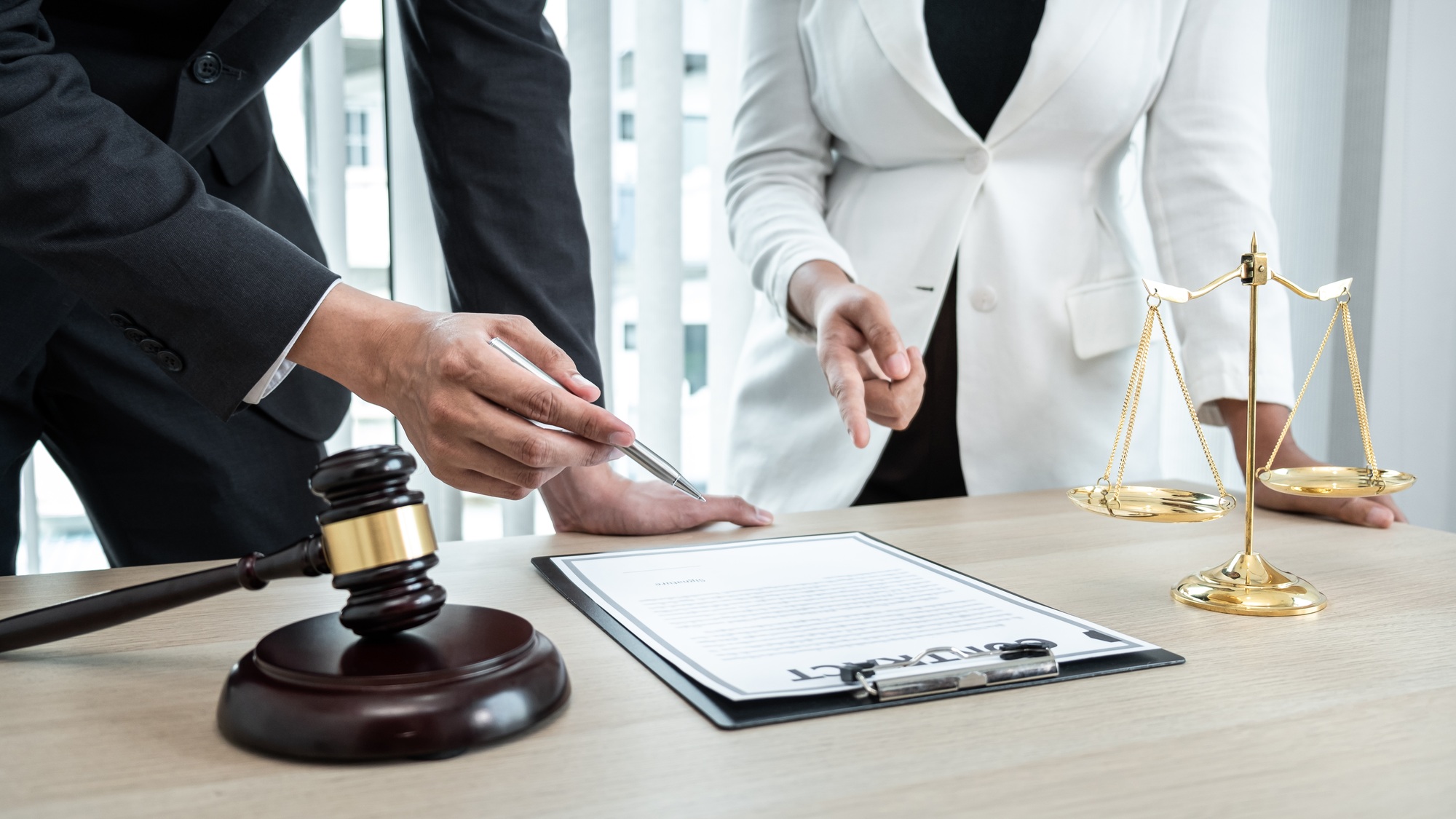 Male lawyer or notary working consulting and discussion to businesswoman client in the office