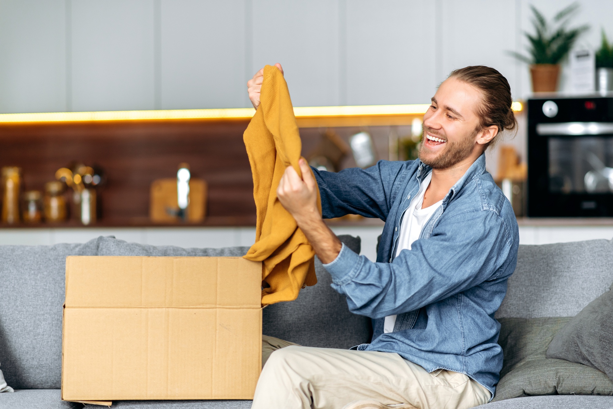 man parcel shopping unpacking delivery blogger