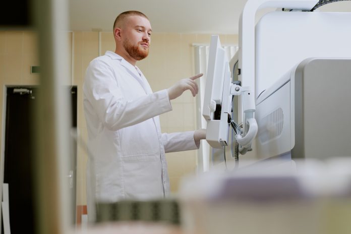 Medical Professional Using Modern Equipment in Laboratory