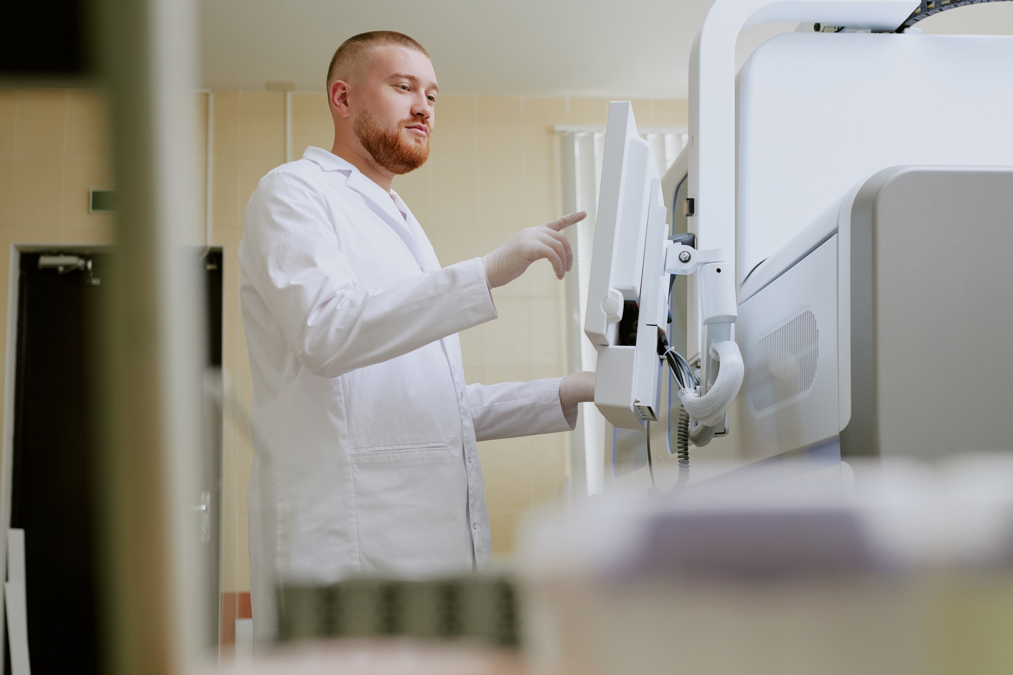 Medical Professional Using Modern Equipment in Laboratory