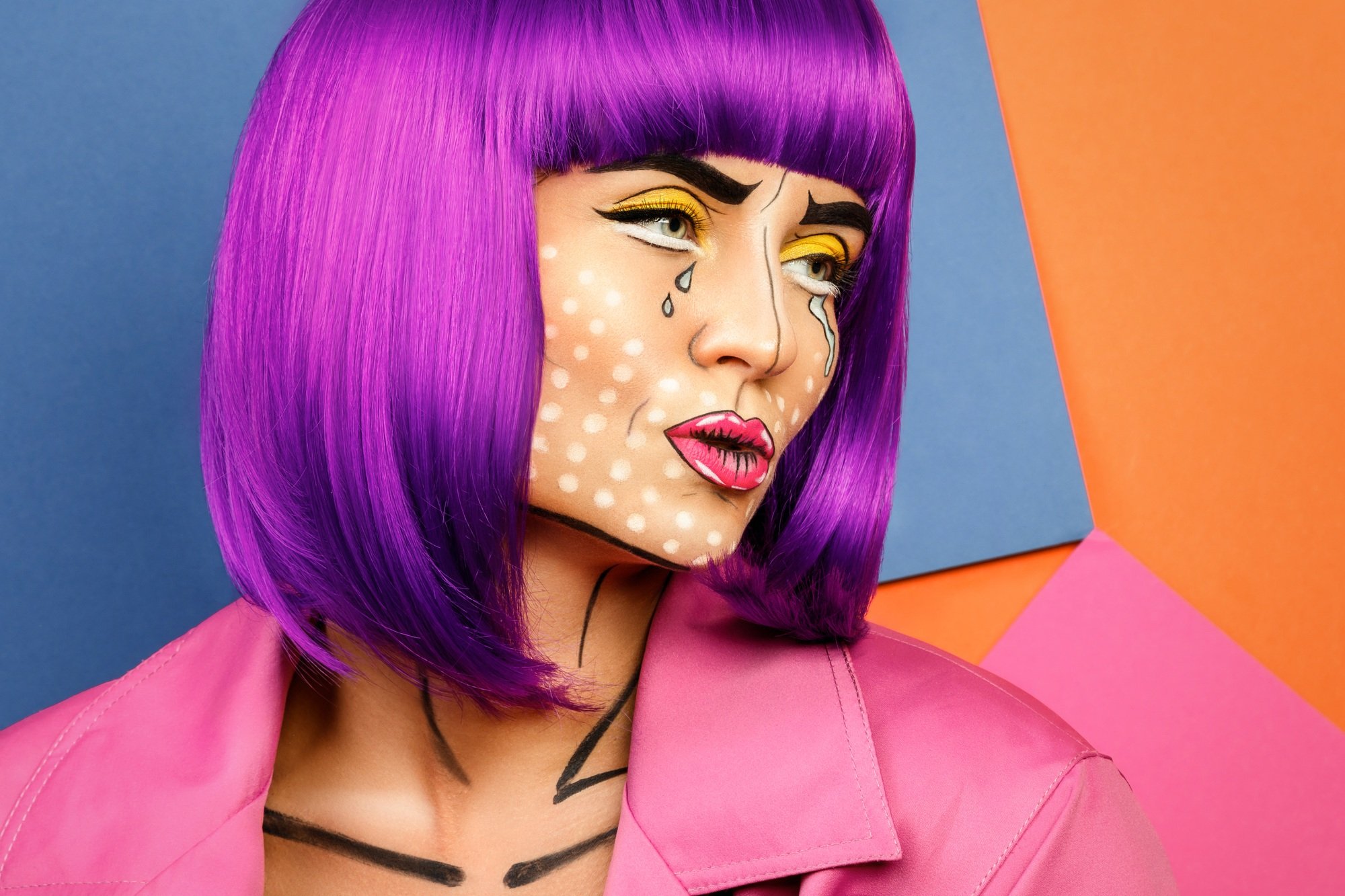 Model in creative image with pop art makeup