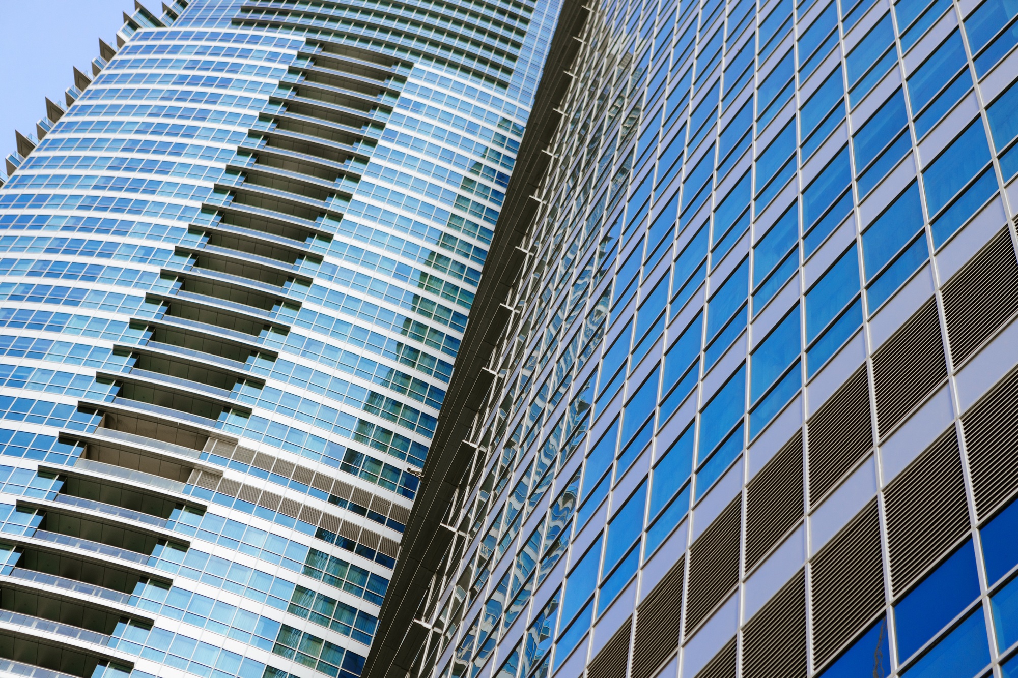 Modern office building with glass facade for background