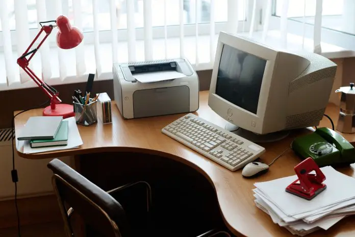 Modern Office Desk with Computer and Supplies