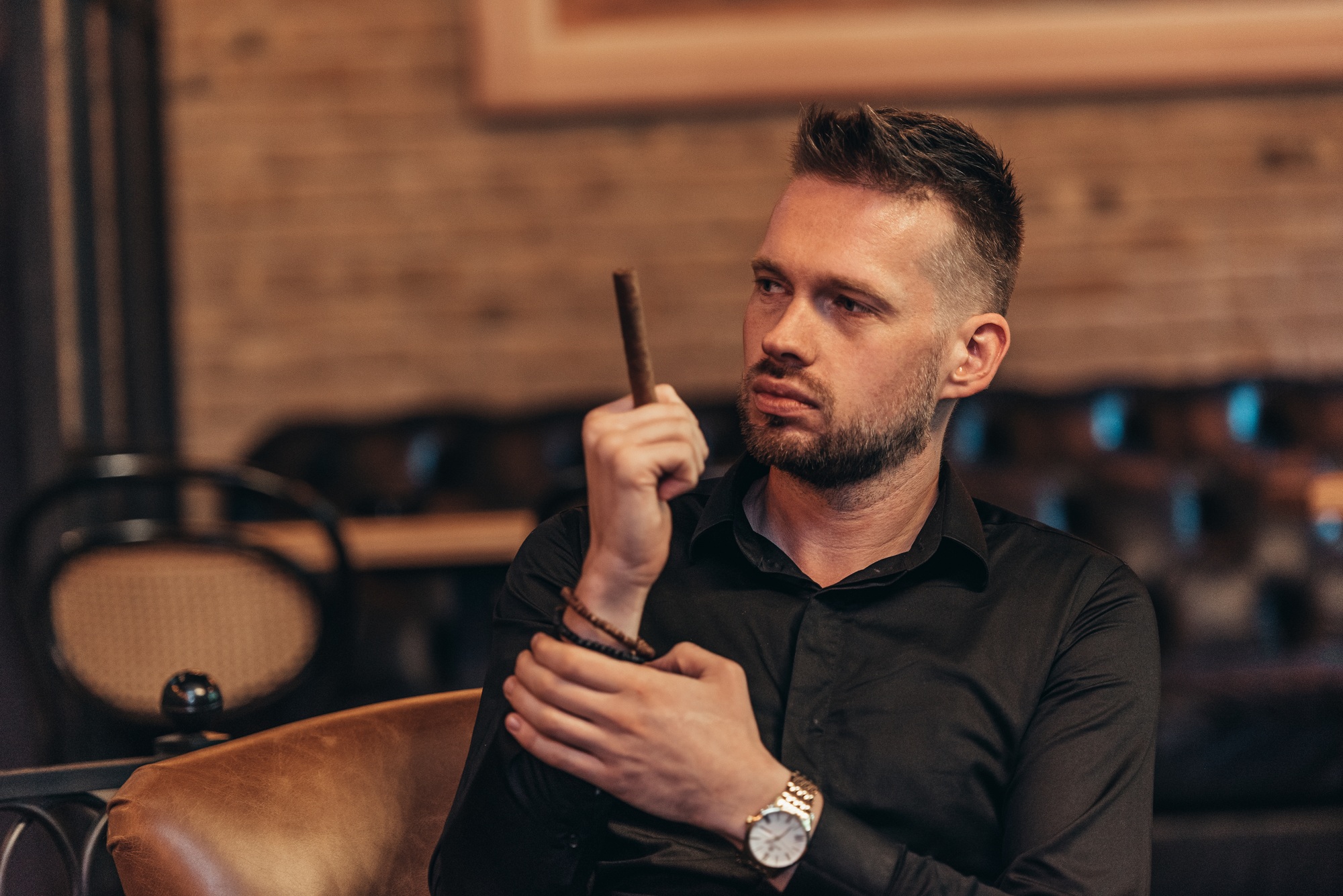 Perfecting his cigar etiquette