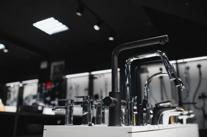 Rows of new faucets in plumbing shop