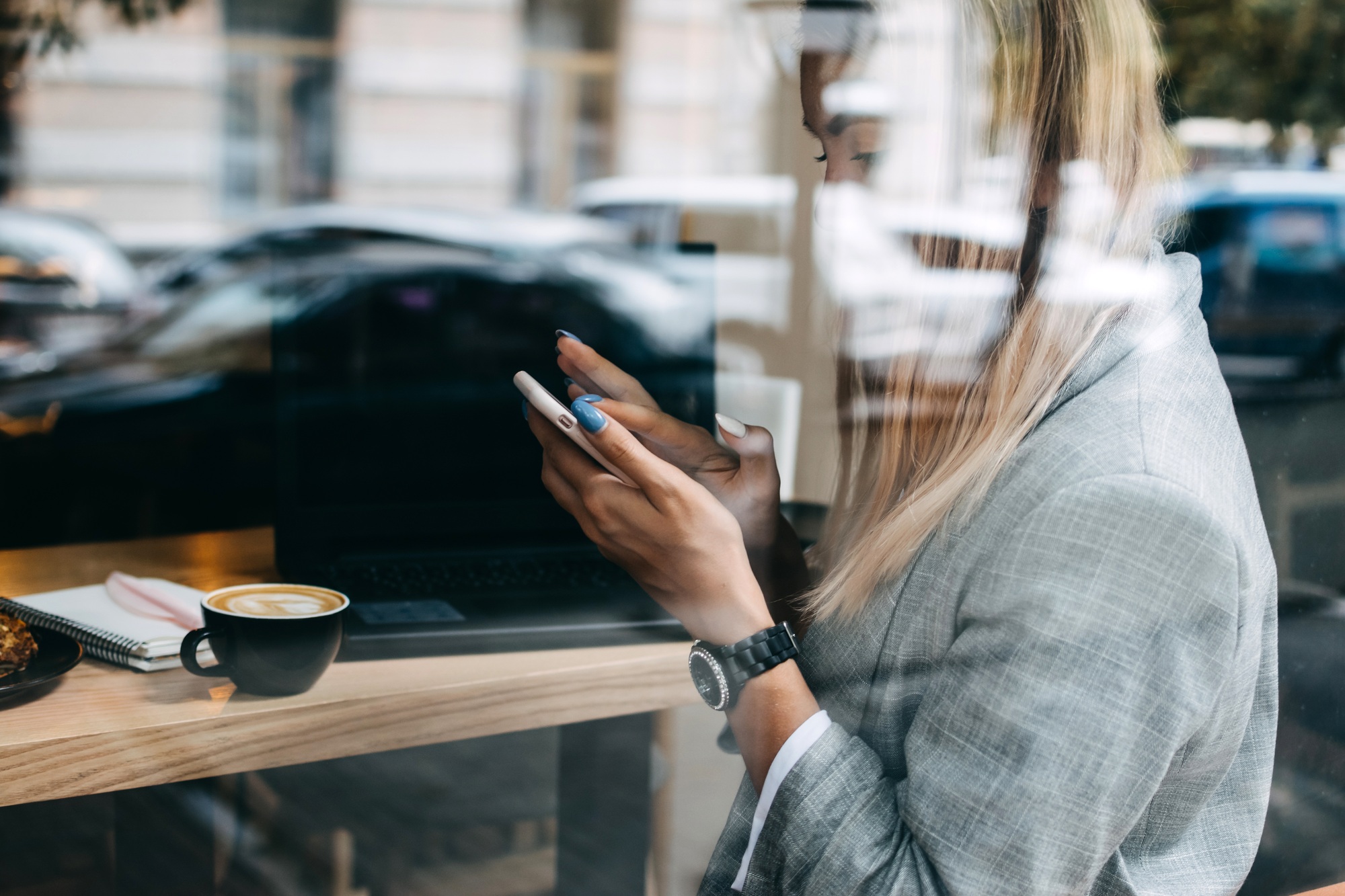 Self-employed young woman working for oneself as freelance or owner of business. Young freelancer