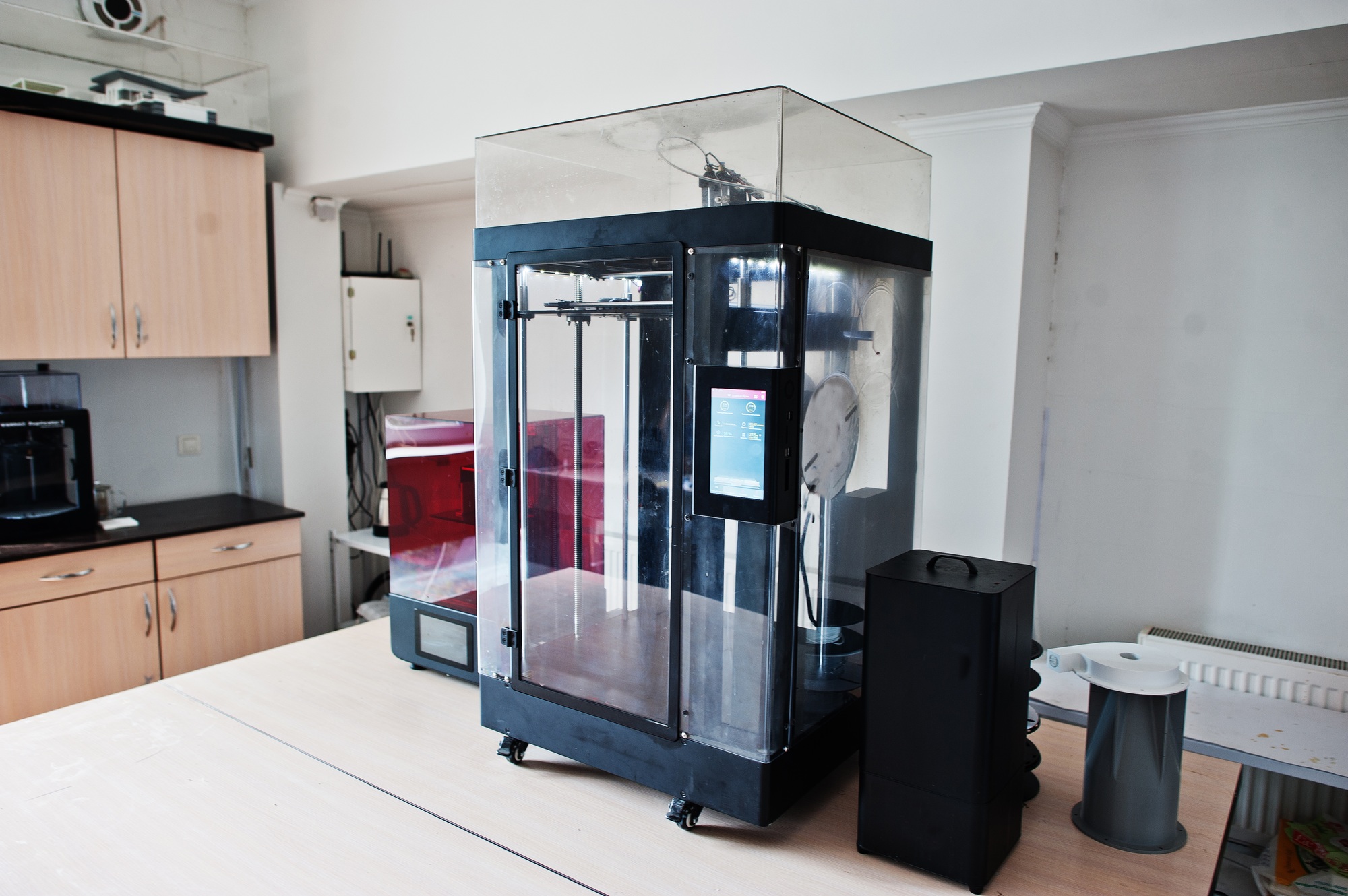 The 3D printing machine operation at work.