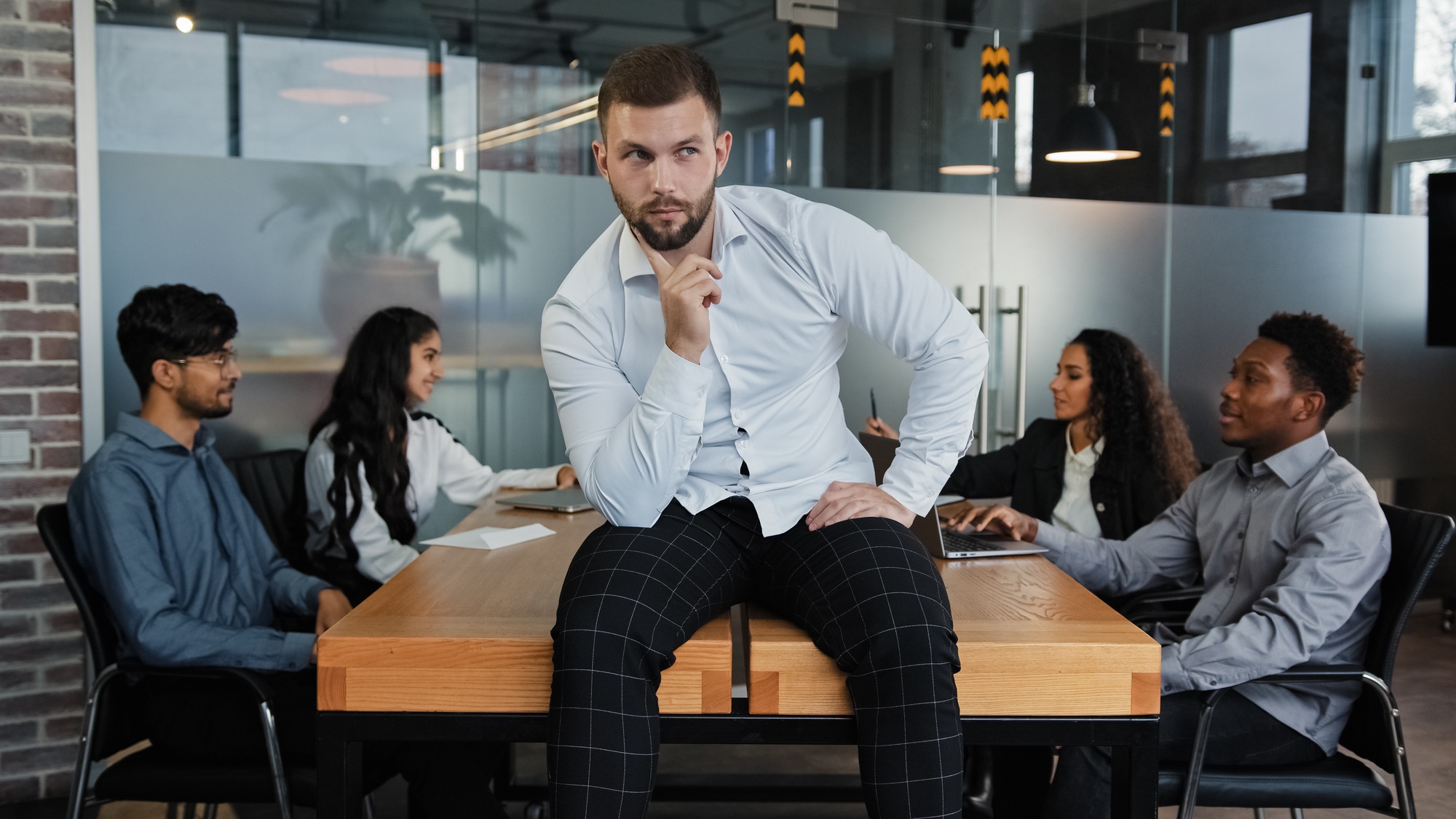 Thoughtful thinking pensive man leader boss businessman think about startup idea company CEO sitting