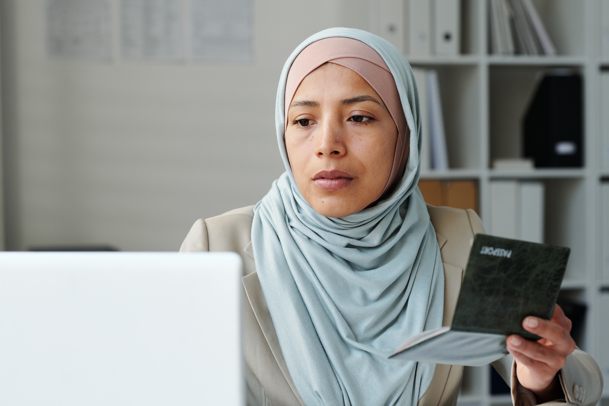 Woman Working With Passport Information