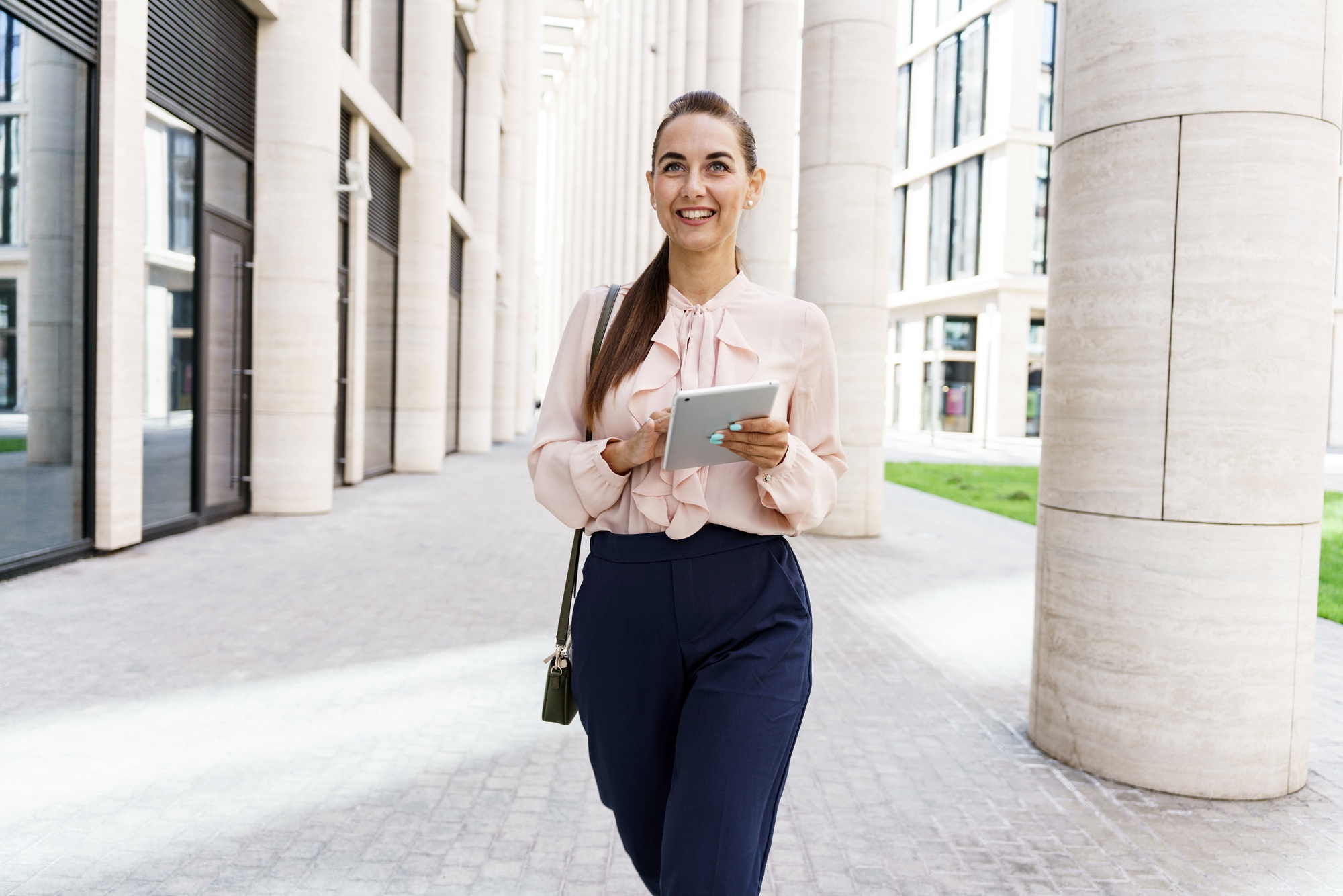 Working as an online consultant in a bank. In the business clothes of an office employee.