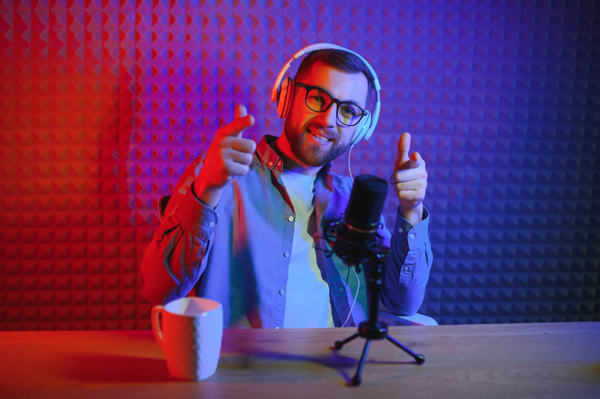 Young blogger recording video indoors.