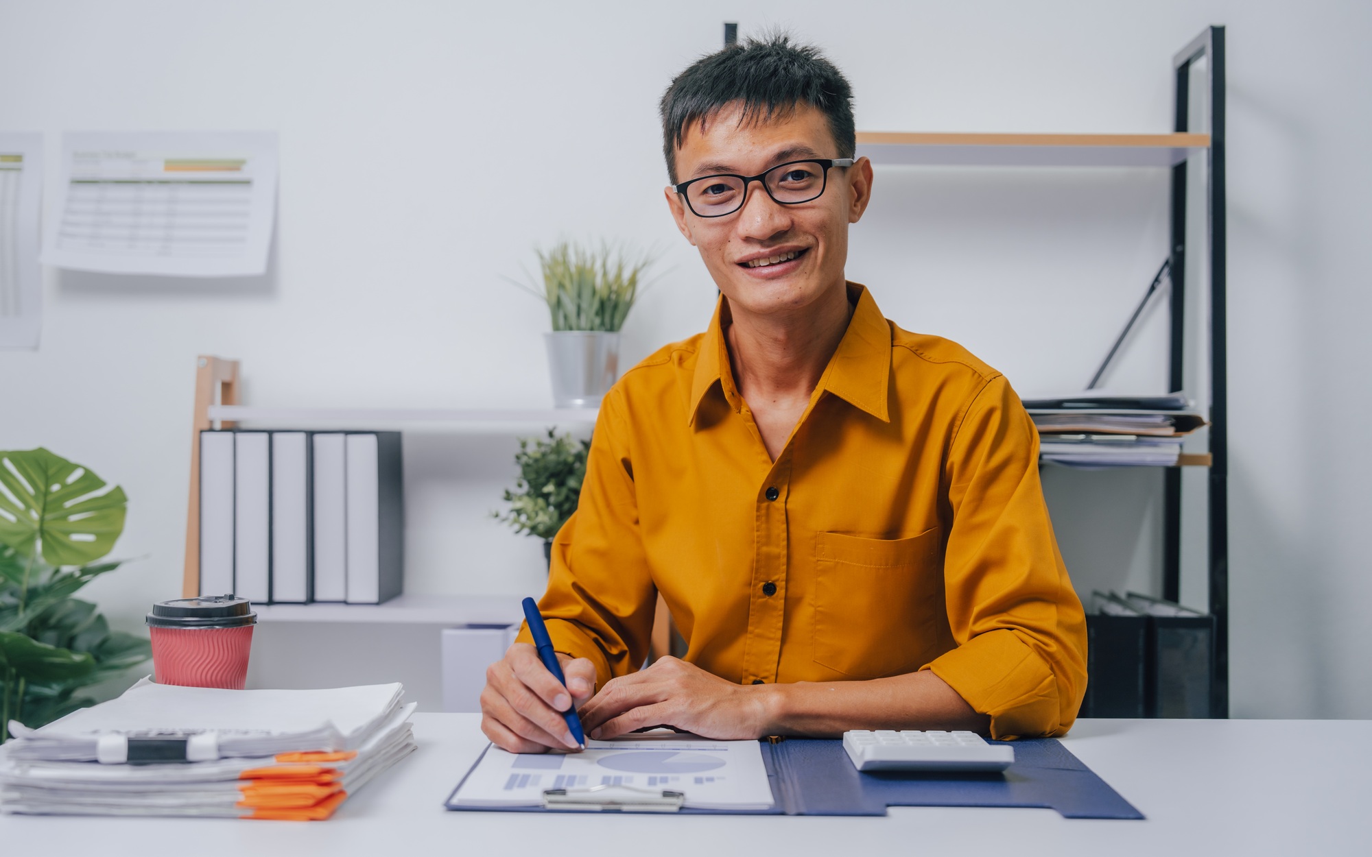 Young Happy asia people bookkeeper doing bookkeeping entrepreneur small business owner accountant