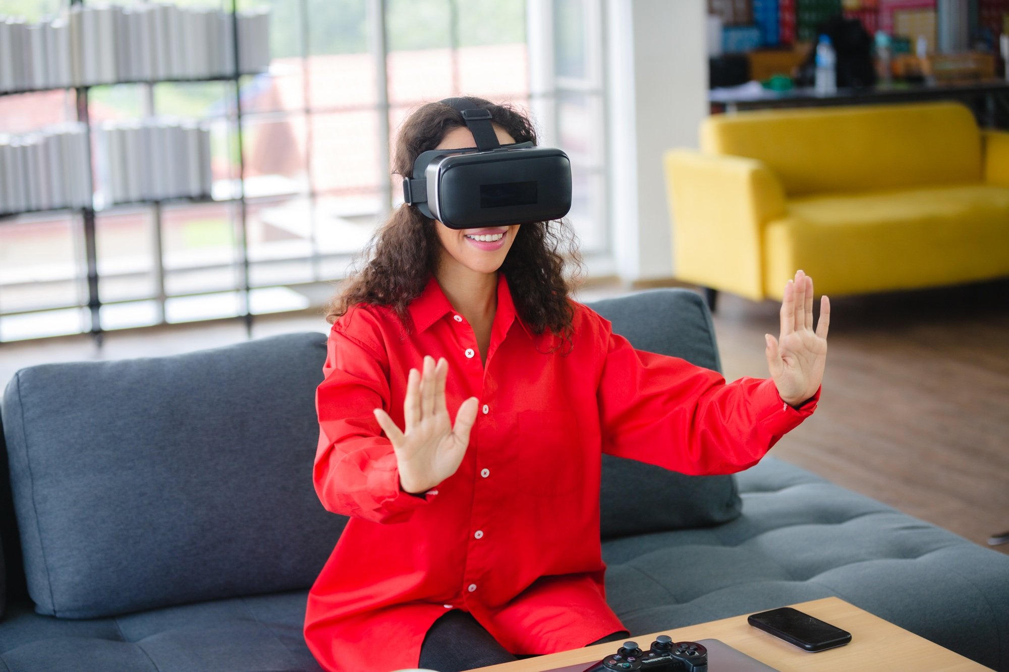 African American woman business person with virtual goggles headset VR device digital technology