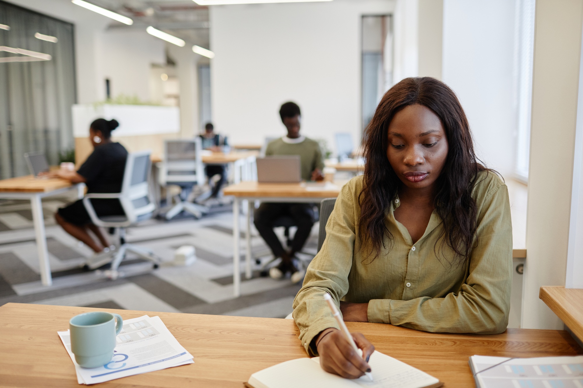 Business Lady Writing in Planner