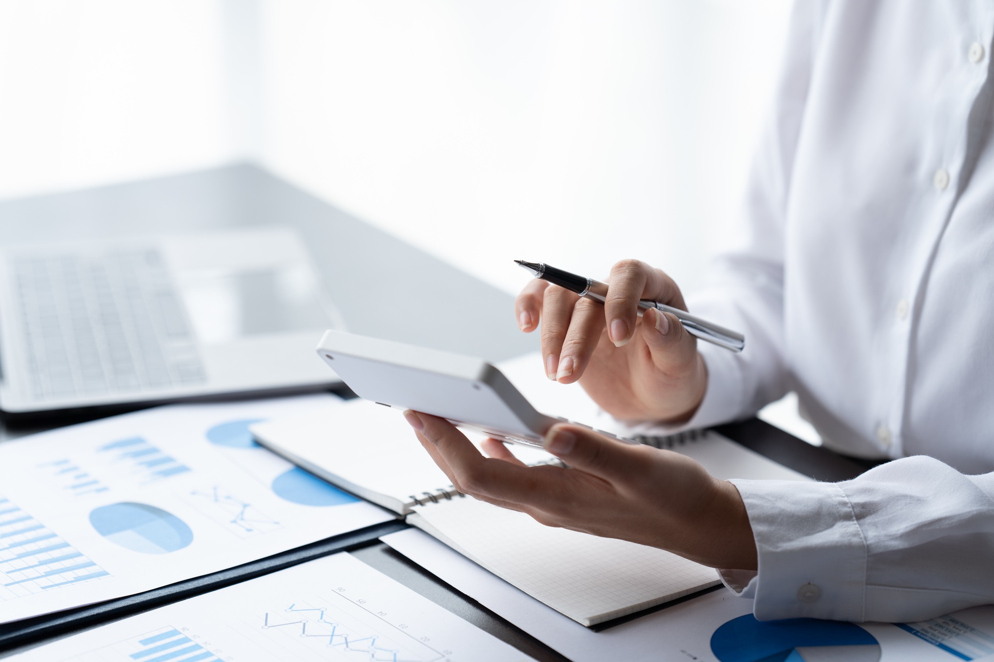 Businessman Accounting Calculating Cost Economic Financial data.