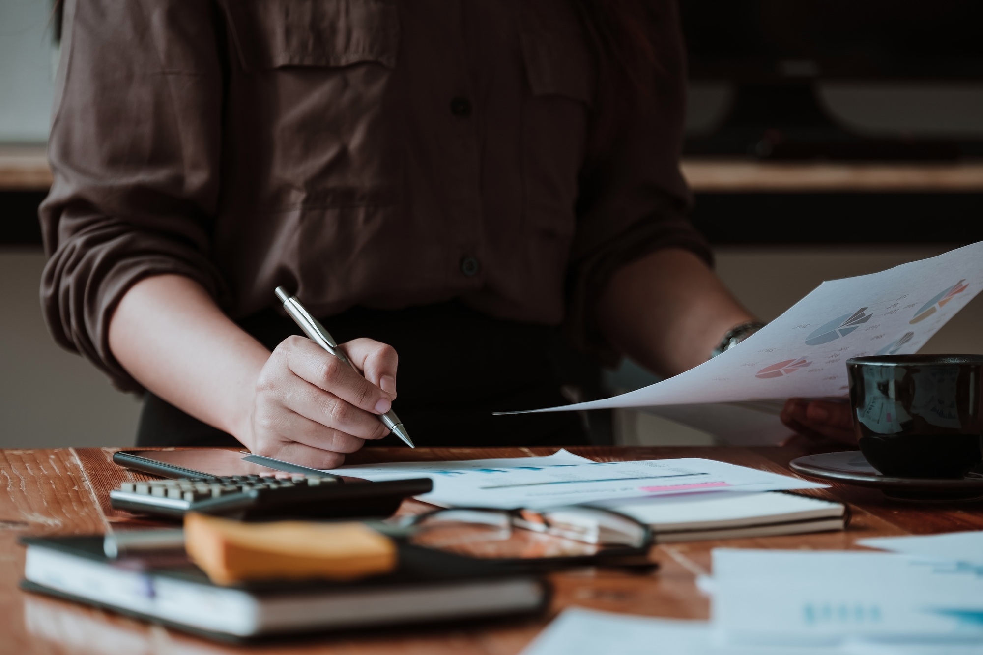businesswoman working data document graph chart report marketing research