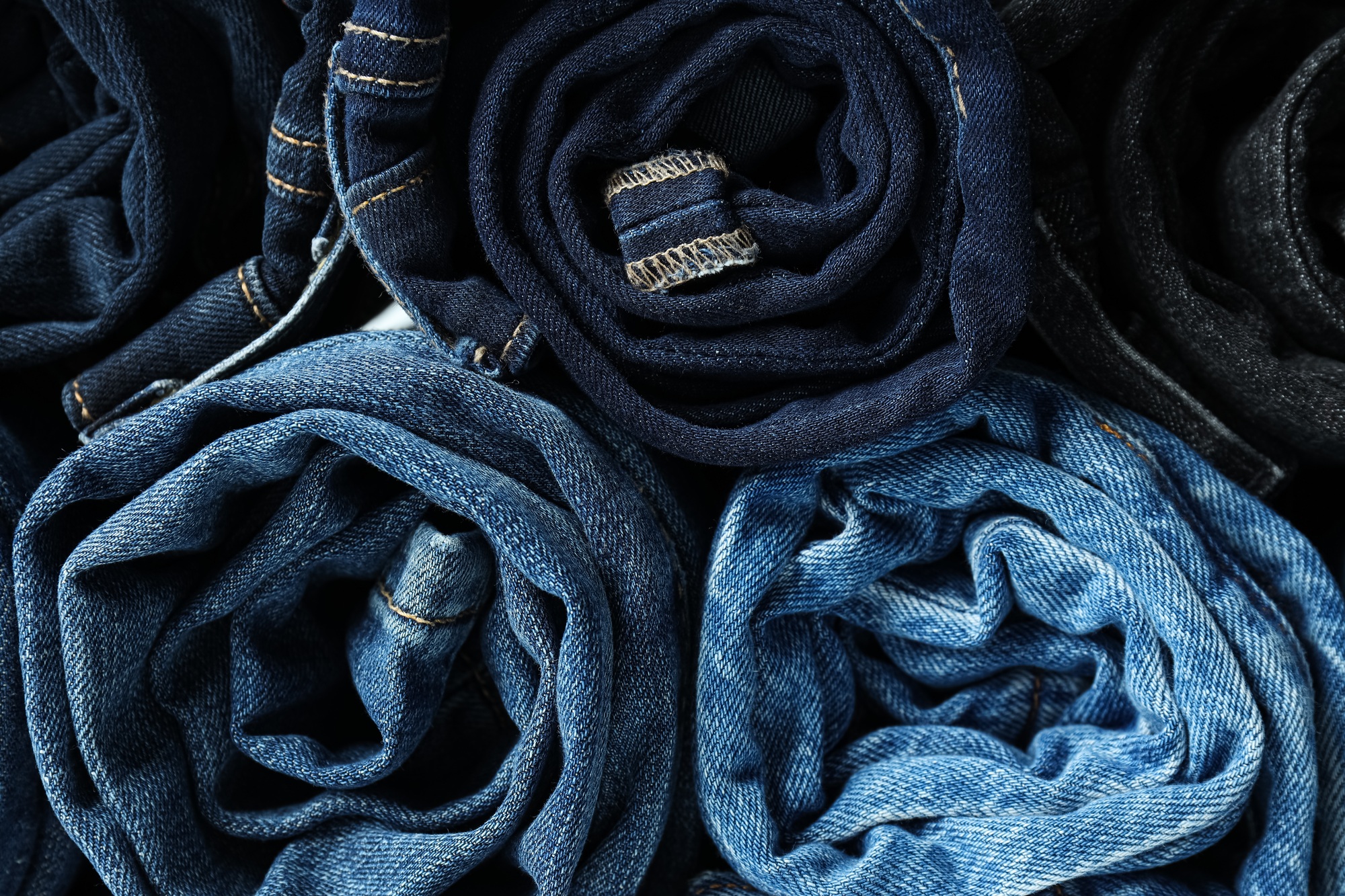 Concept of modern casual clothes - jeans, rolled jeans