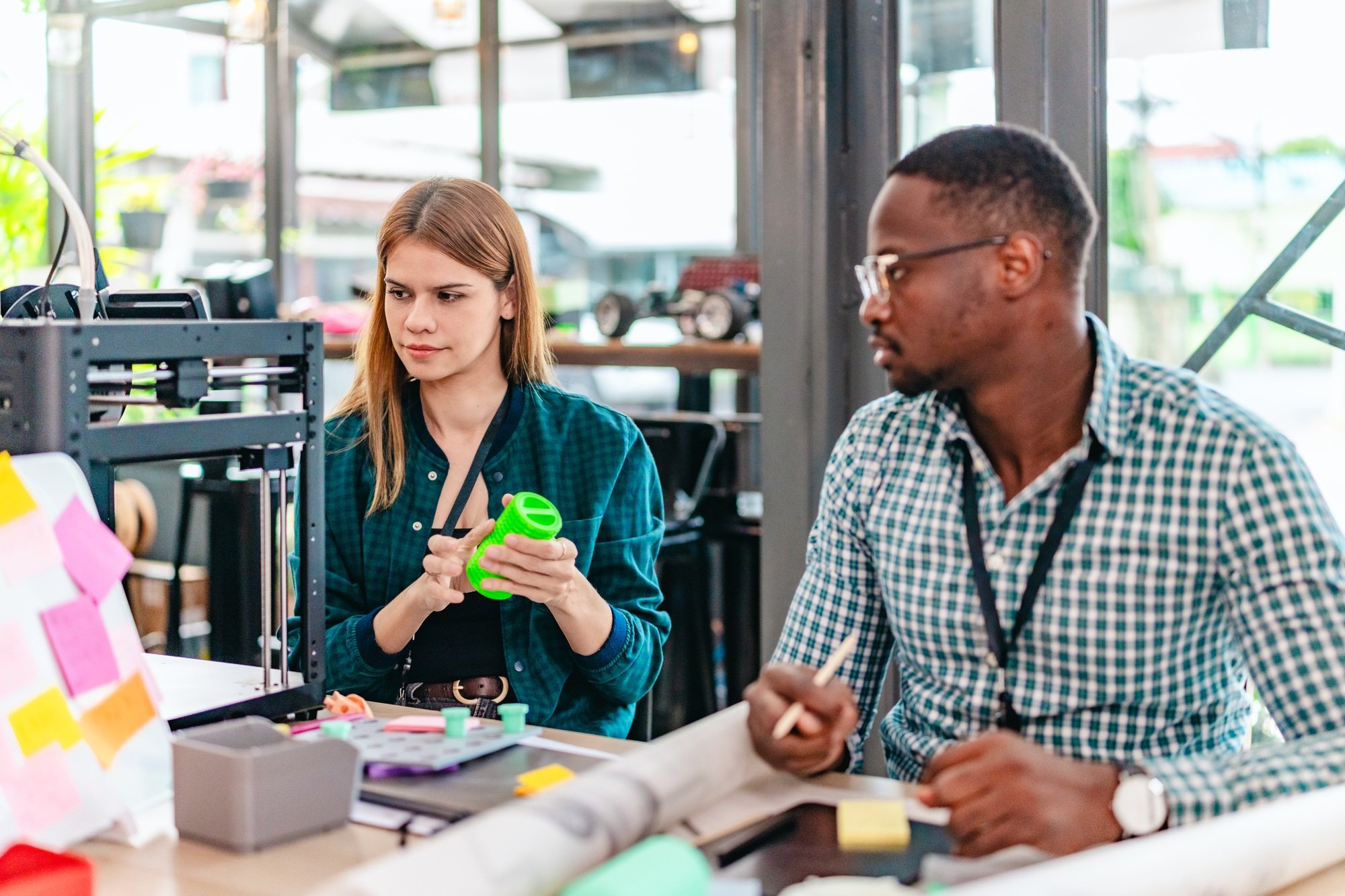 Diverse Startup Team Working on 3D Printing Project