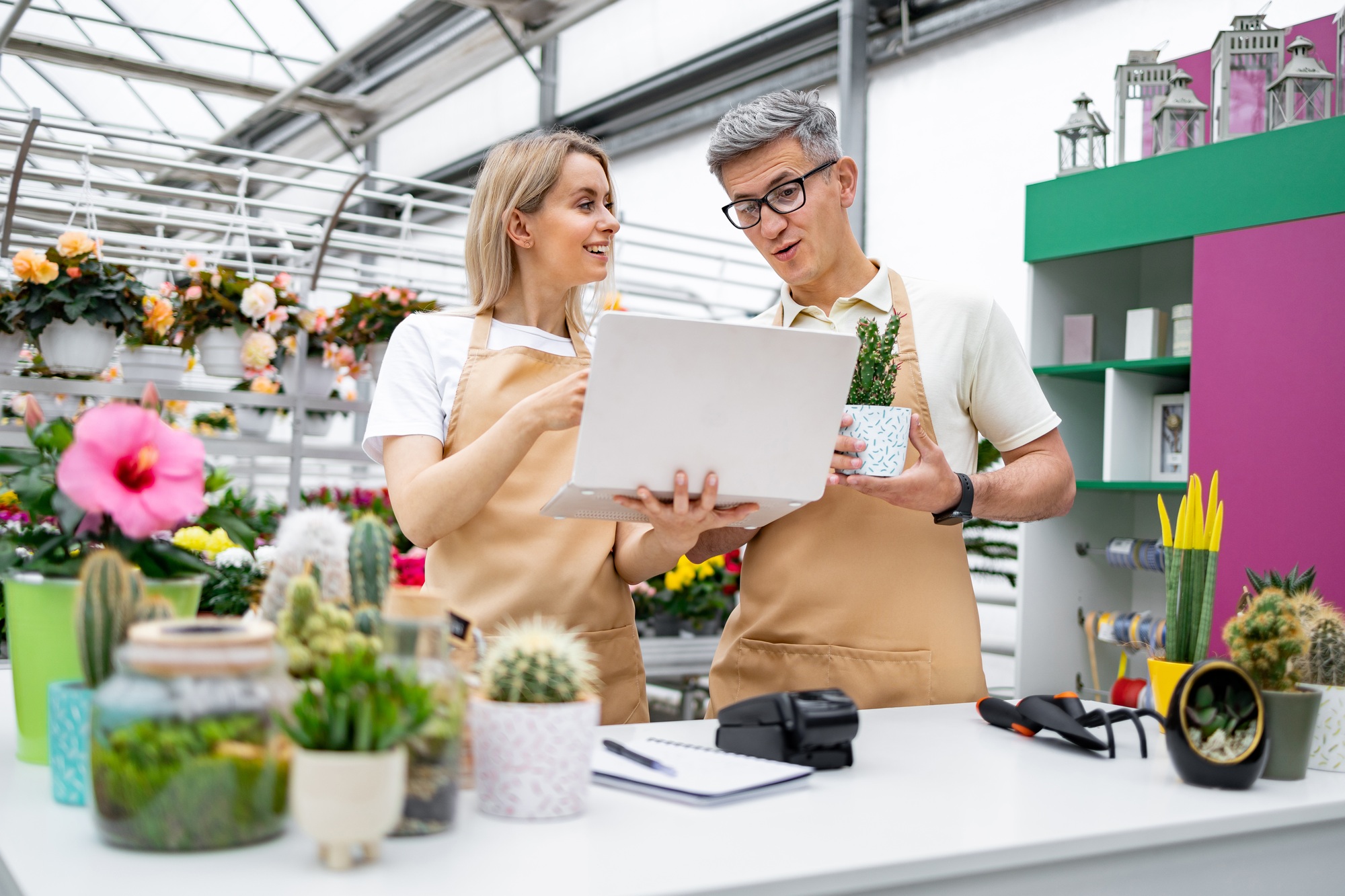 Florist Discussing Sales on a Laptop