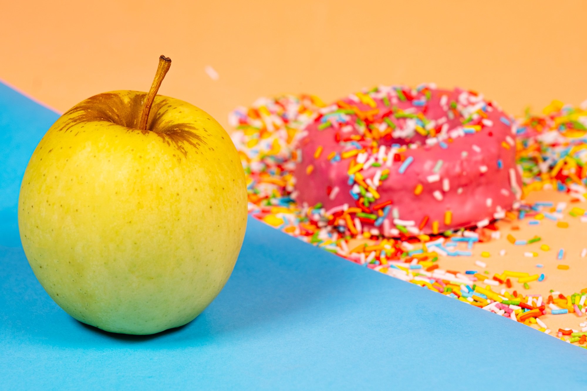 Health concept. Healthy food versus fattening food.