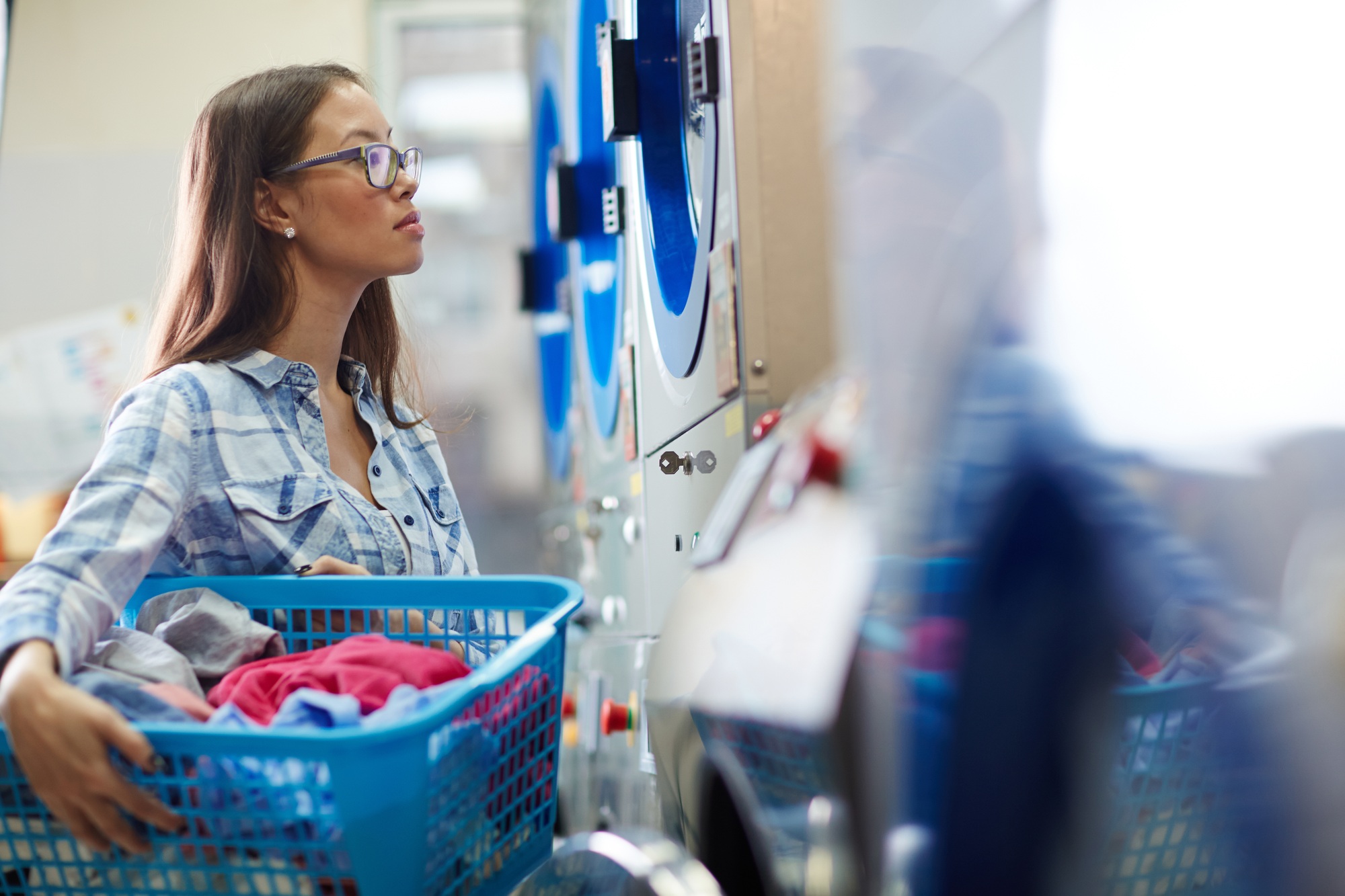 Maid with laundry-basket