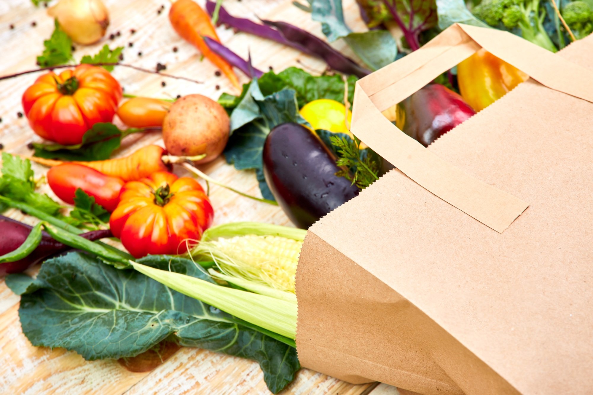 Paper bag of different health vegetables food