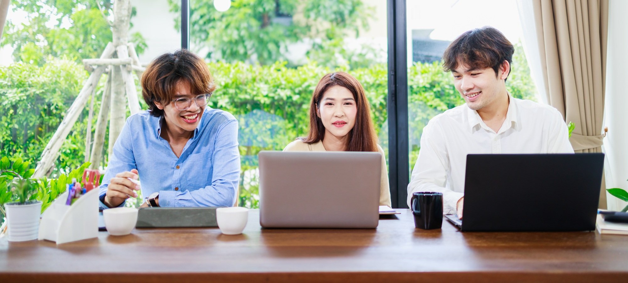 Startup business concept. Three Business people working at home office. home working business