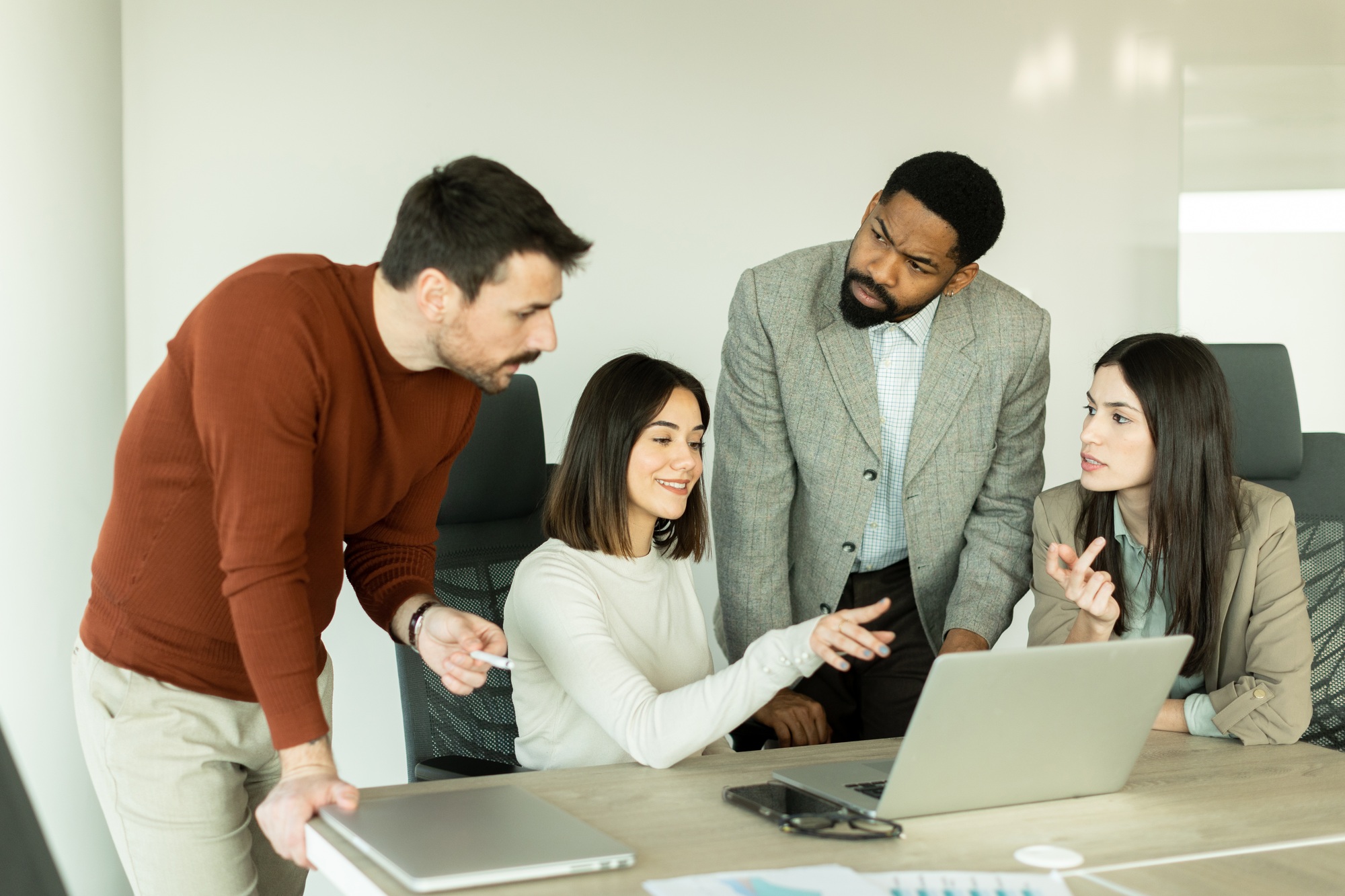 Team collaboration in a modern office setting creates innovative solutions and ideas