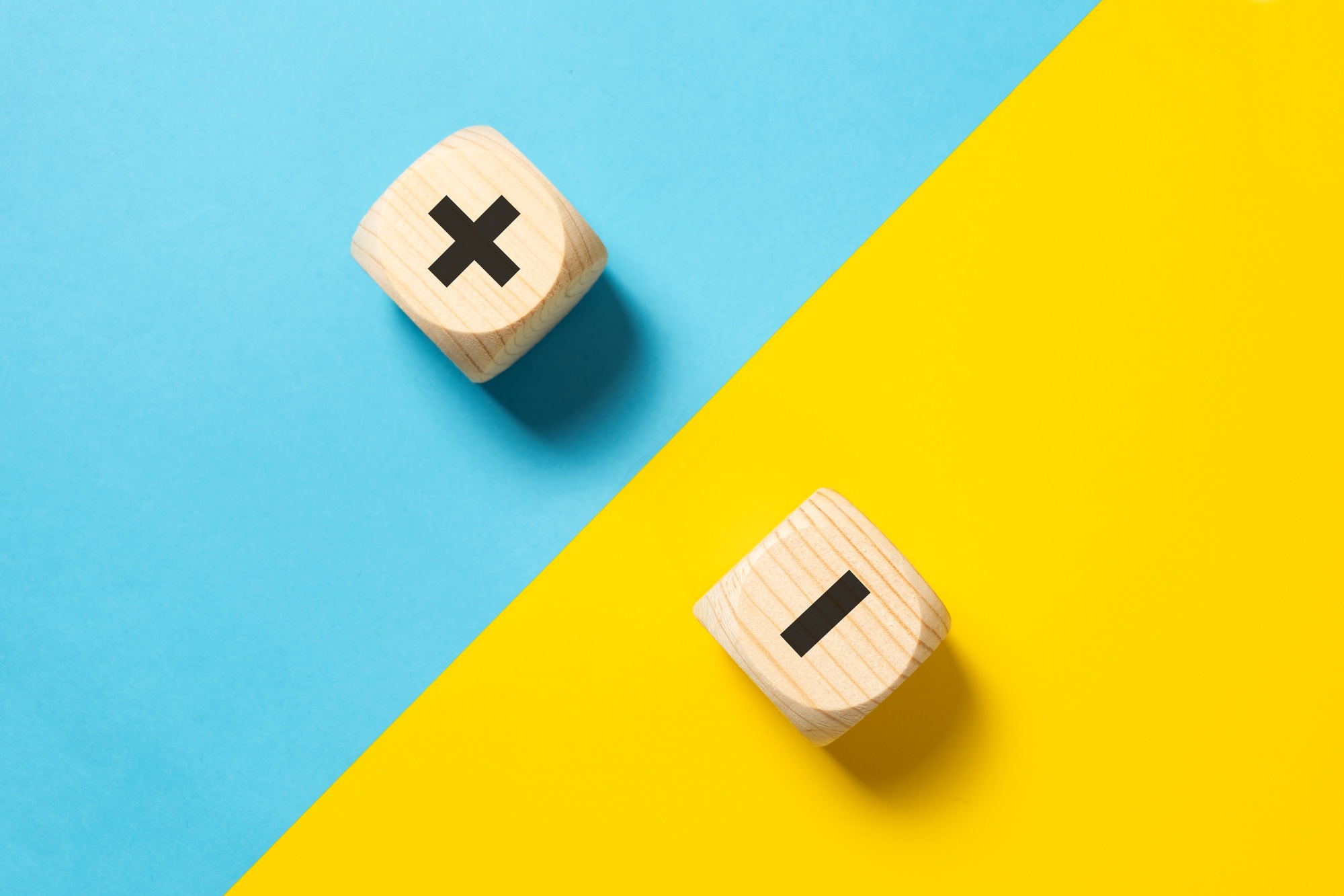 The concept of opposites or pros and cons using plus and minus signs